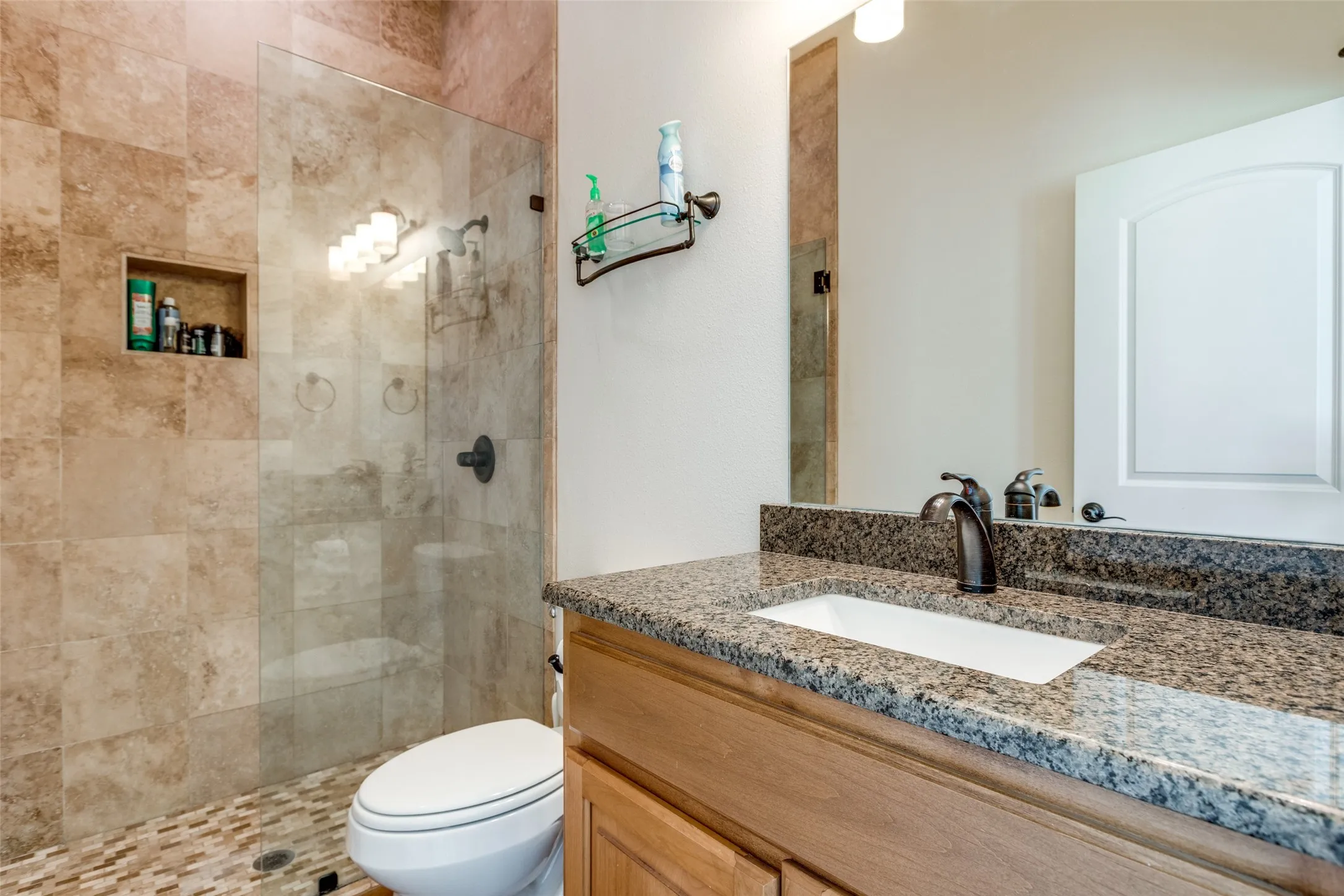 Bathroom featuring vanity and walk in shower