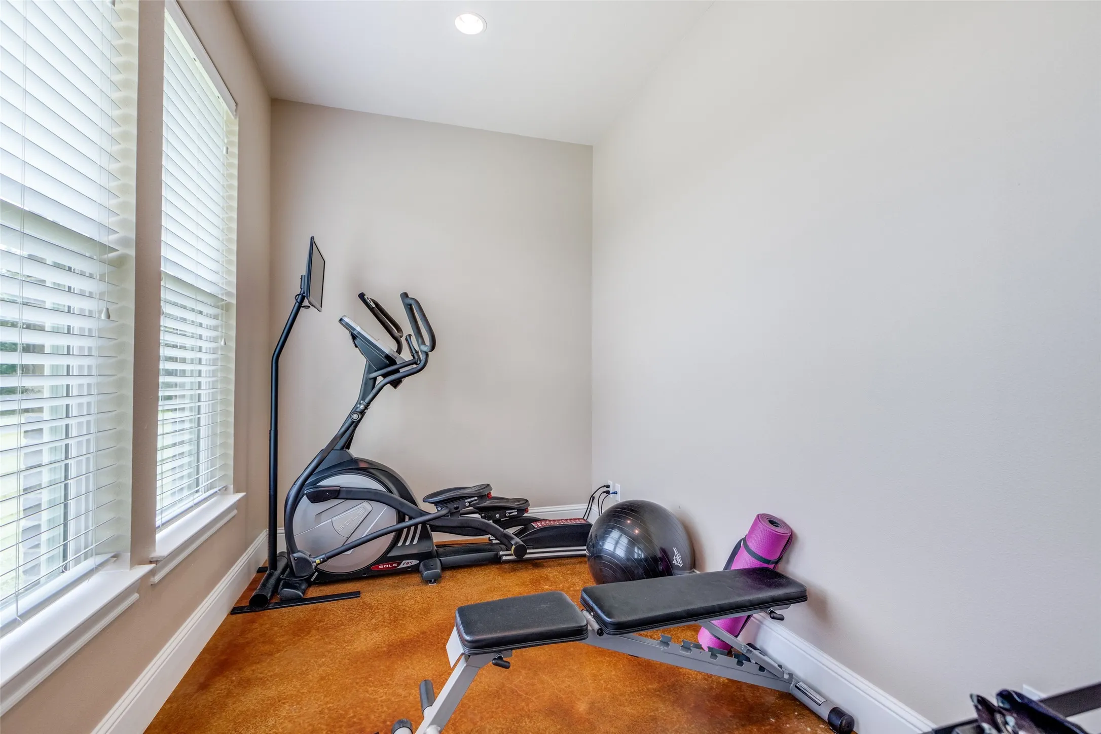 Workout area featuring carpet and recessed lighting