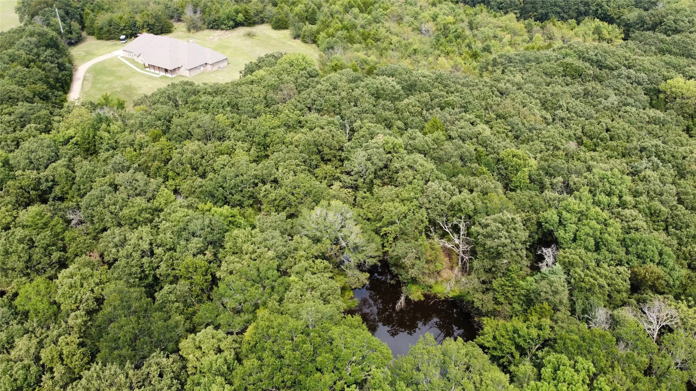 Aerial view of property's location relative to Spring Fed Pond