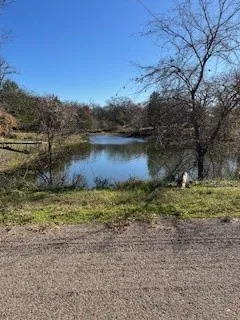 View of pond feature from road , Fairfield Drive at bridge