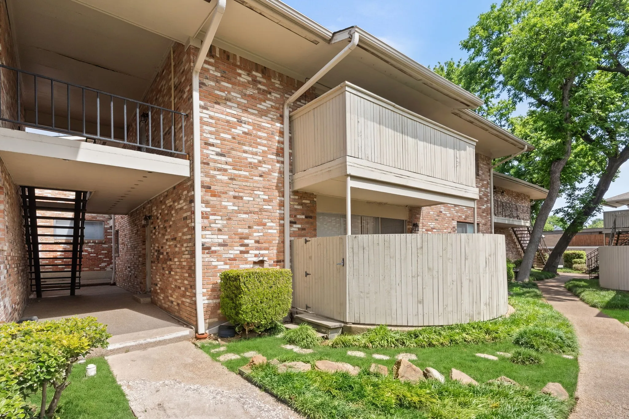 Unit 109 Is Located On The 1st Floor With A Covered Patio