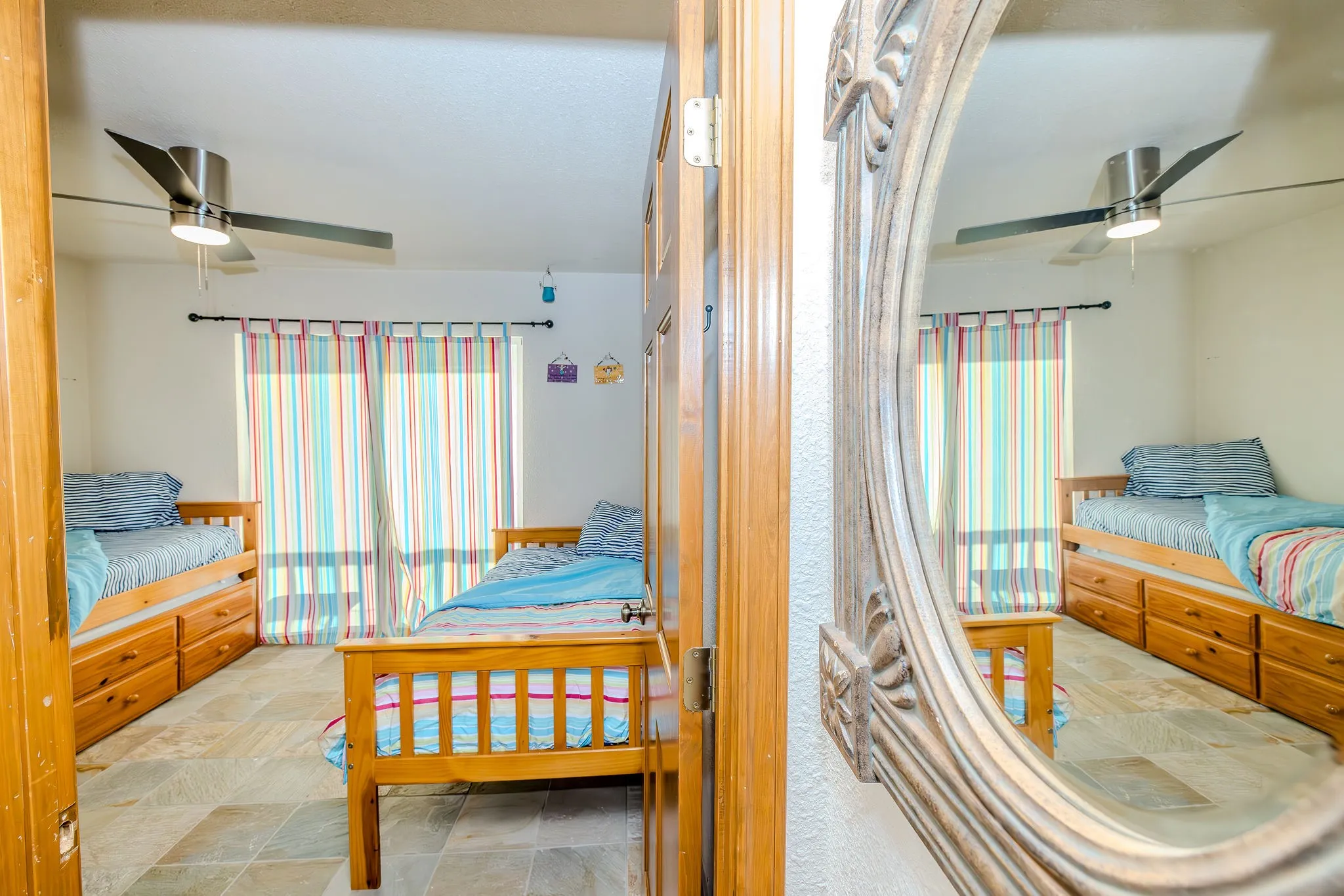 A view of the guest room with the drapes closed.