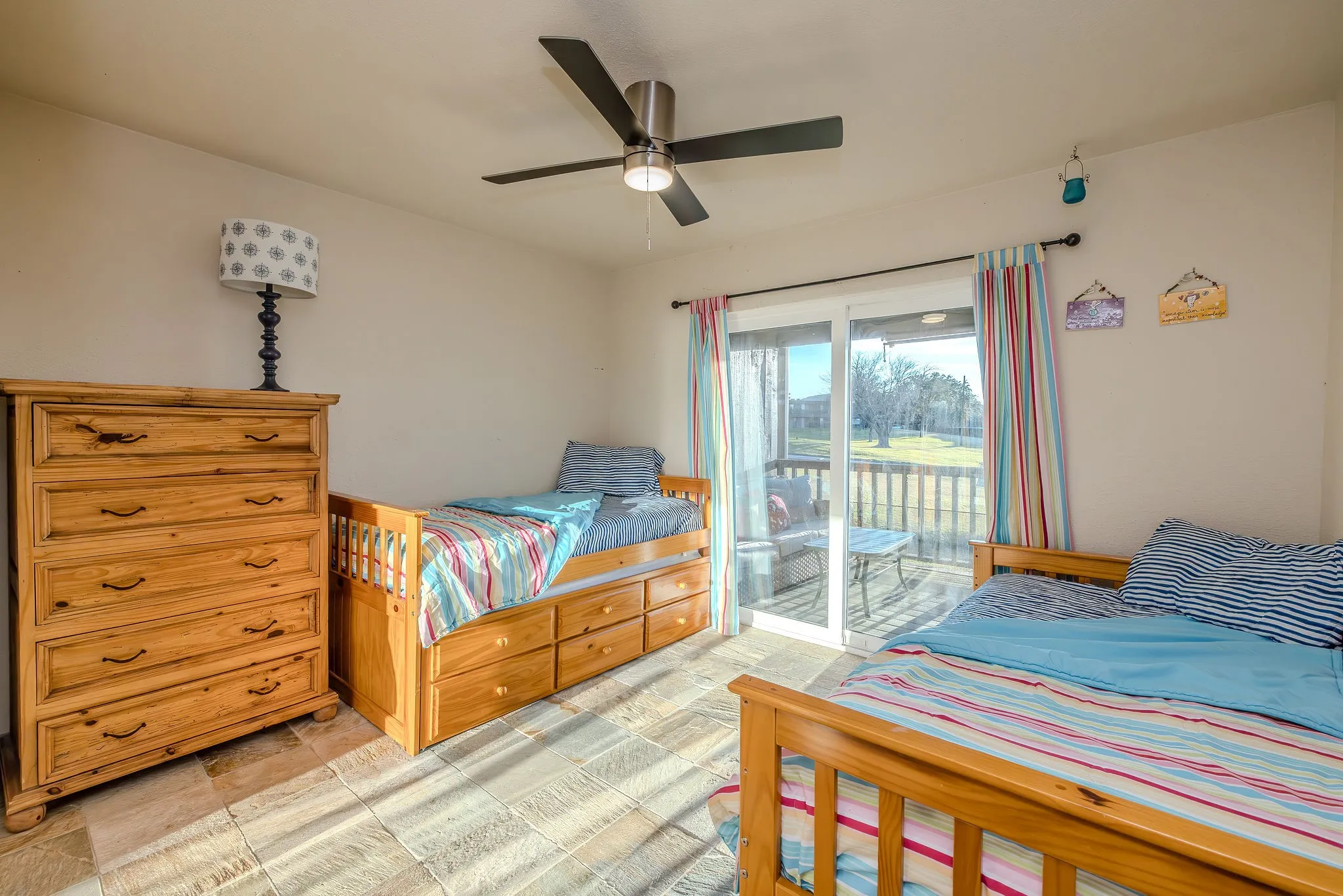 Guest bedroom features private access to the balcony.