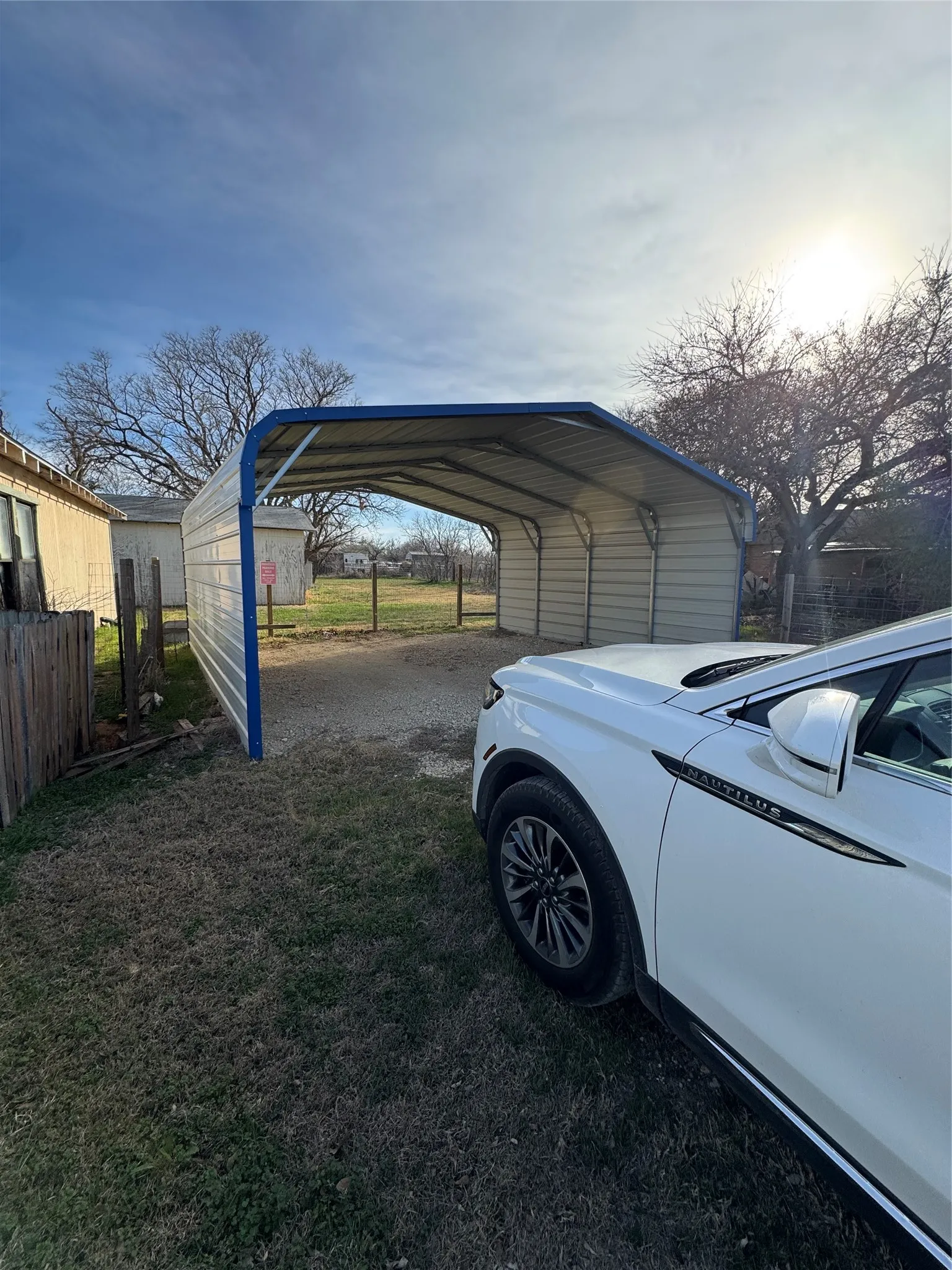 Carport in front of house