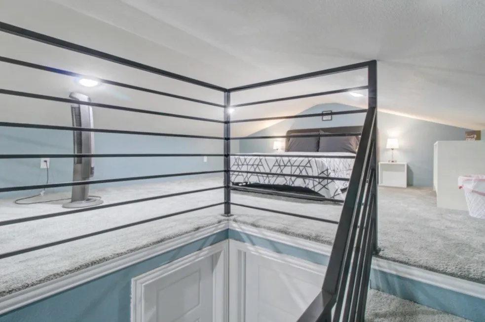 Tiny house image of the bedroom space upstairs