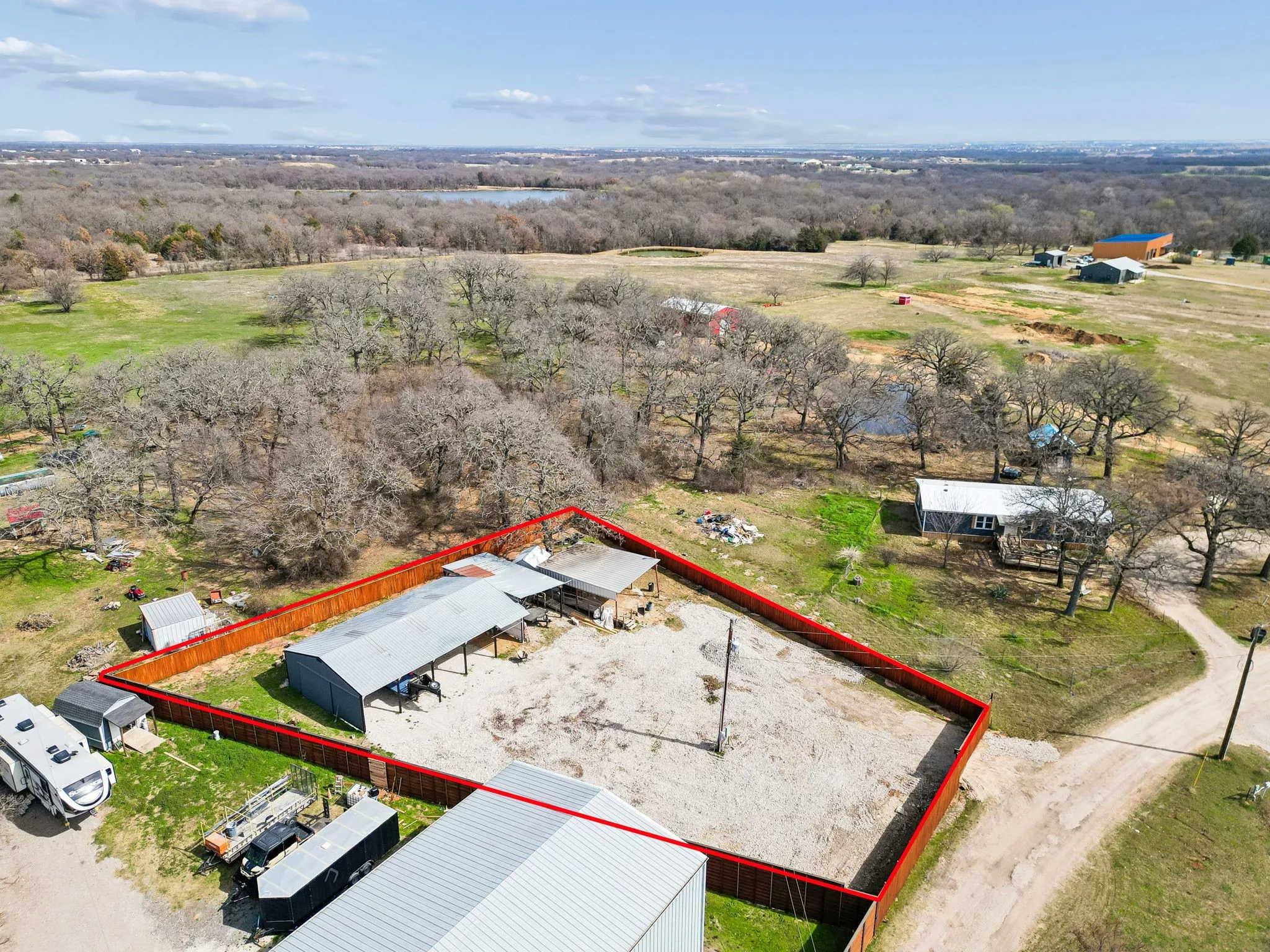 Aerial overview of property's location featuring property parcel outlined