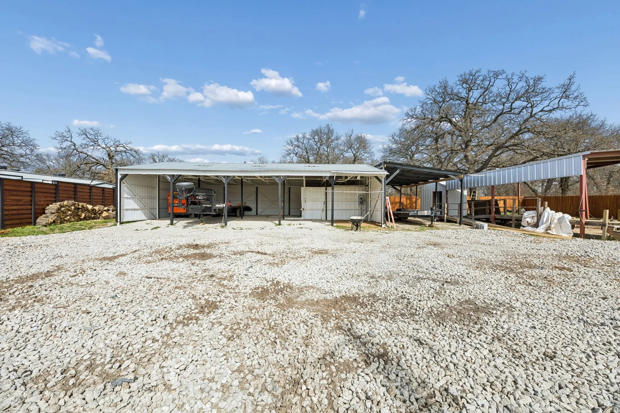 View of outdoor structure featuring a carport