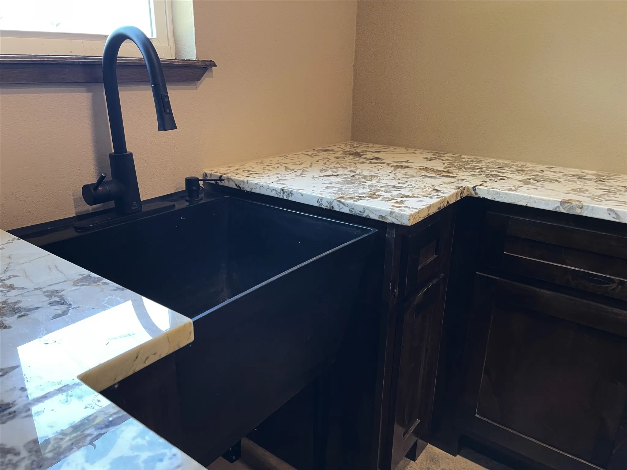 Utility Sink in Laundry Rm