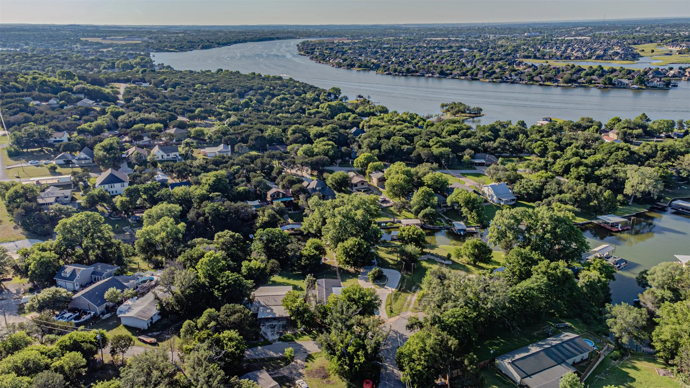 Expansive waterfront community featuring numerous properties with direct water access