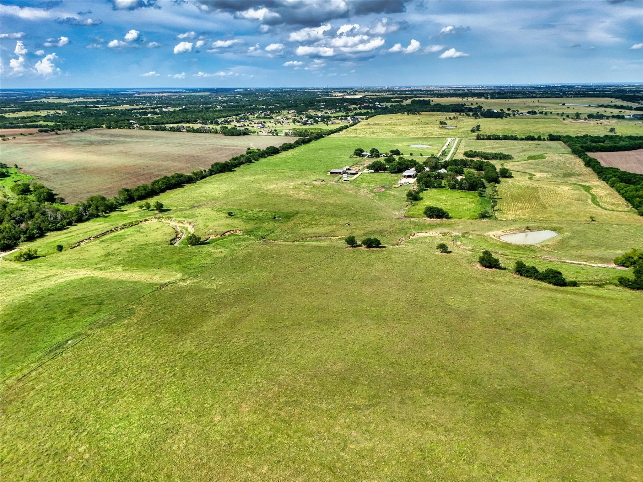 Aerial overview of property's location with rural landscape