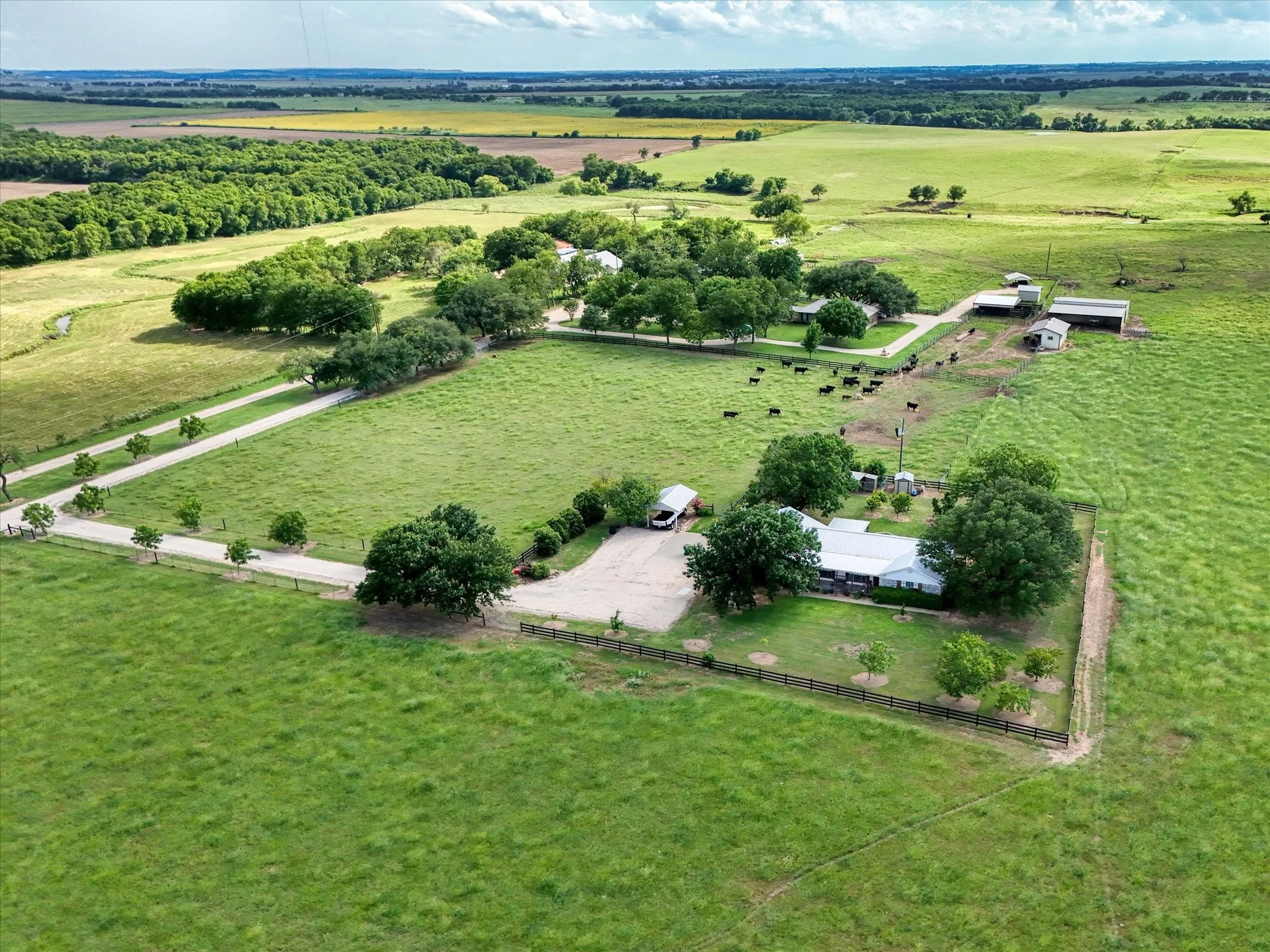 Aerial view of sparsely populated area featuring extensive farmland
