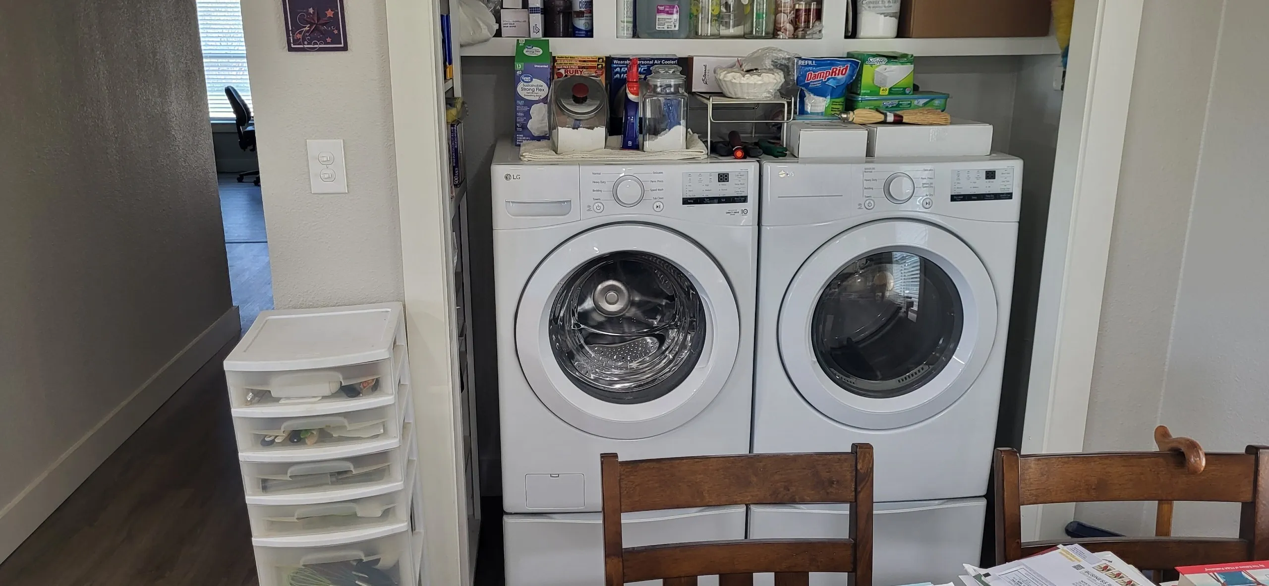 Laundry room with washing machine and clothes dryer