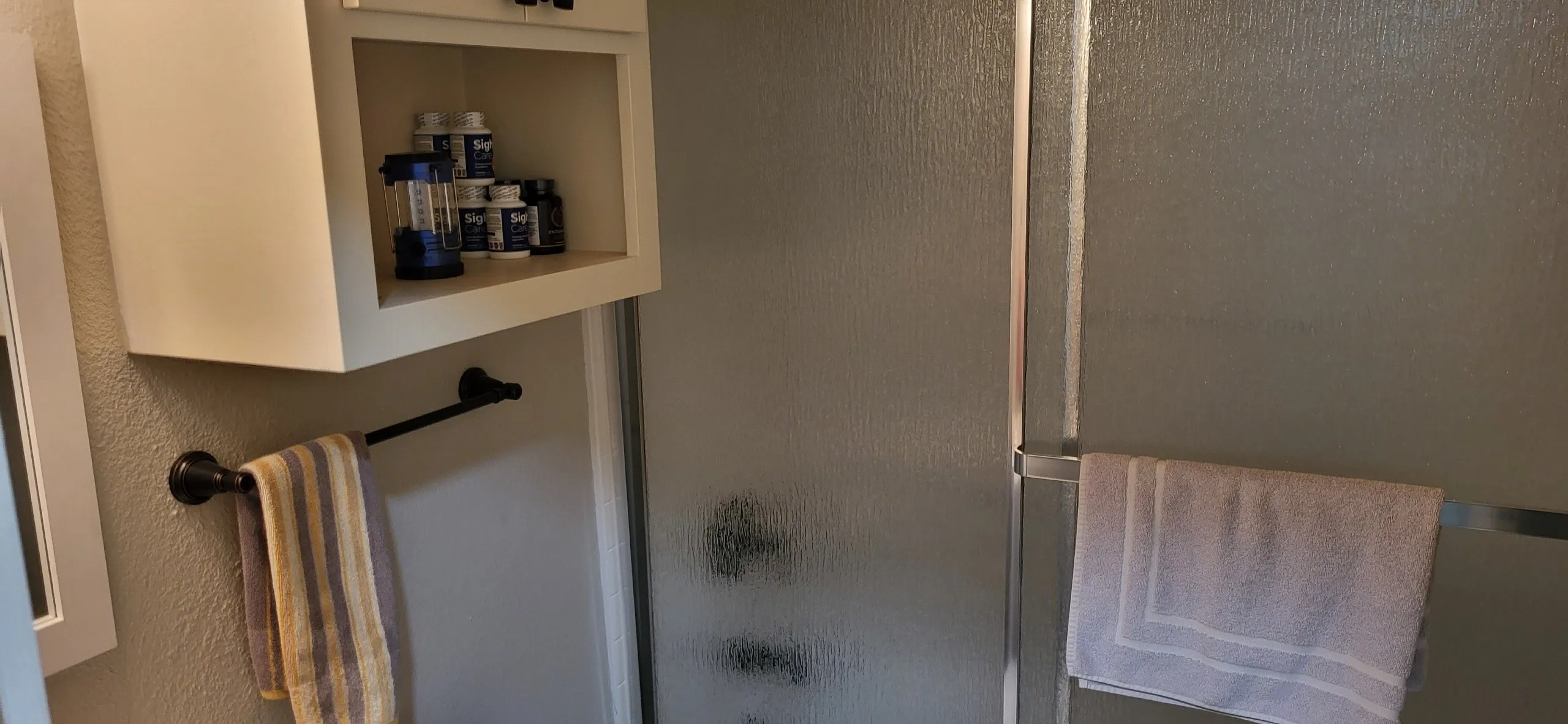Bathroom featuring an enclosed shower