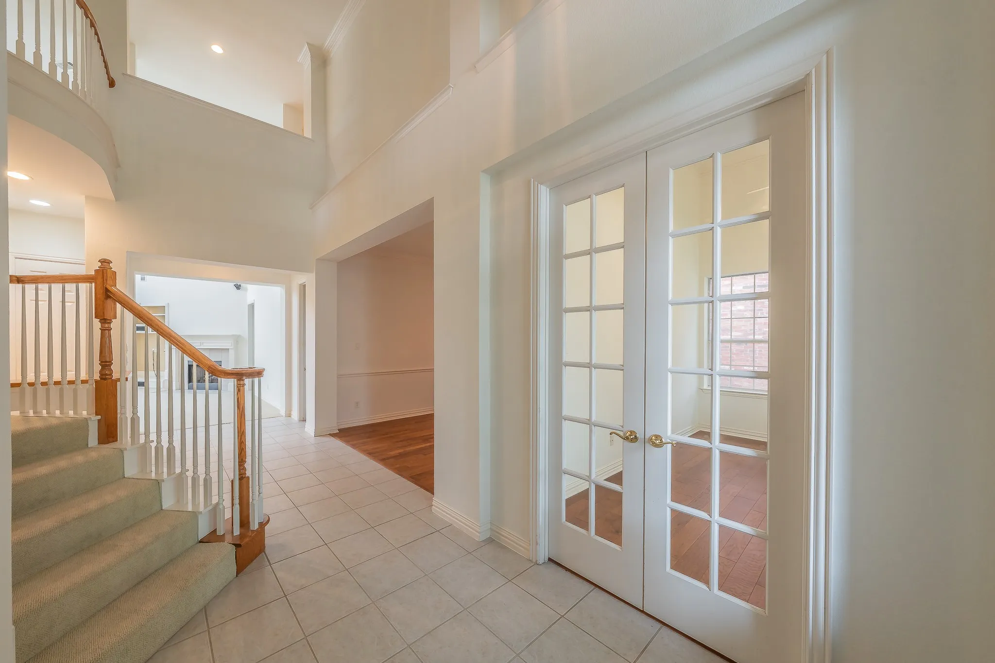 Just inside the front door, office to the right then formal dining room.