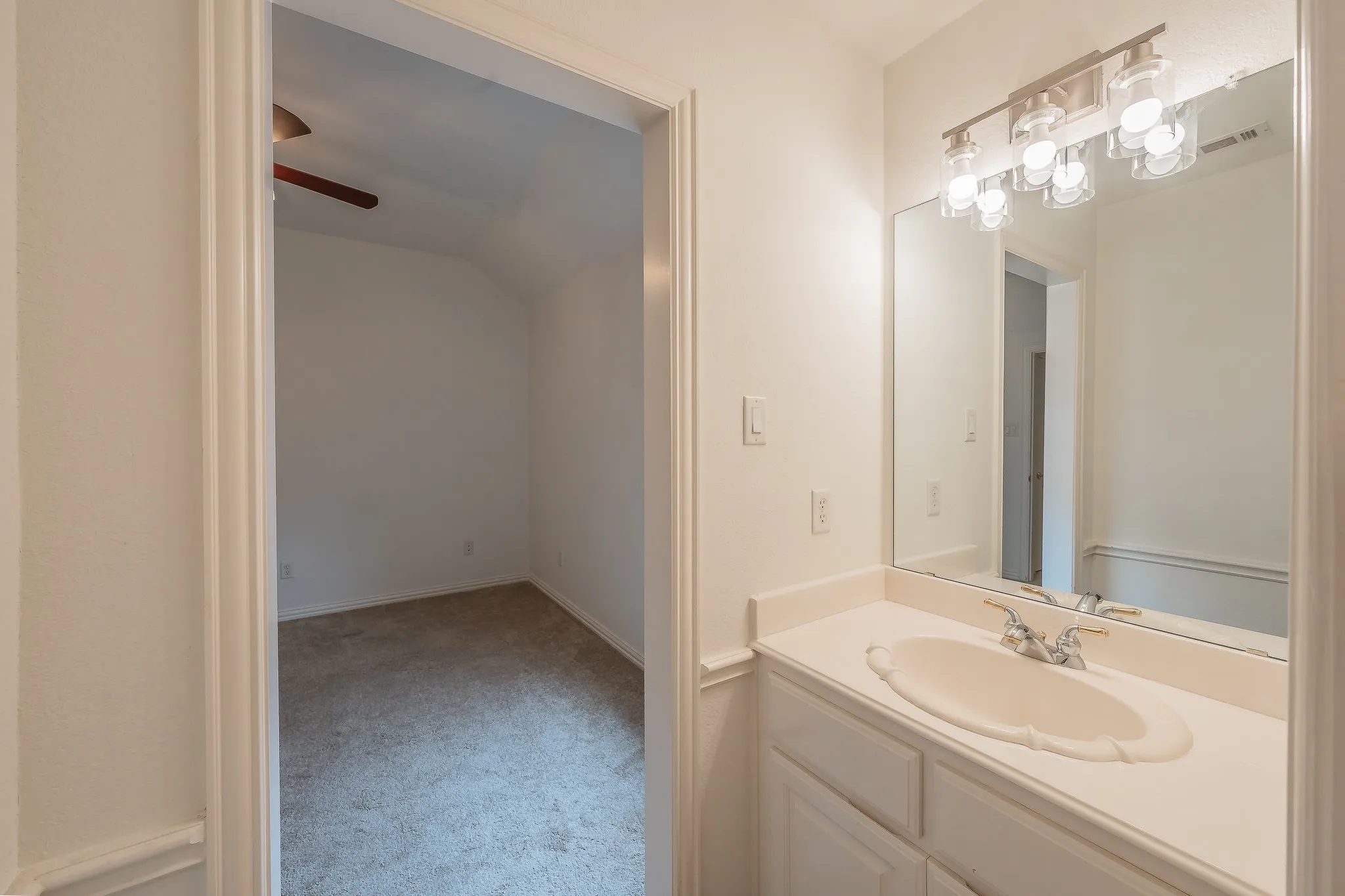Jack and Jill bathroom upstairs with new lighting.