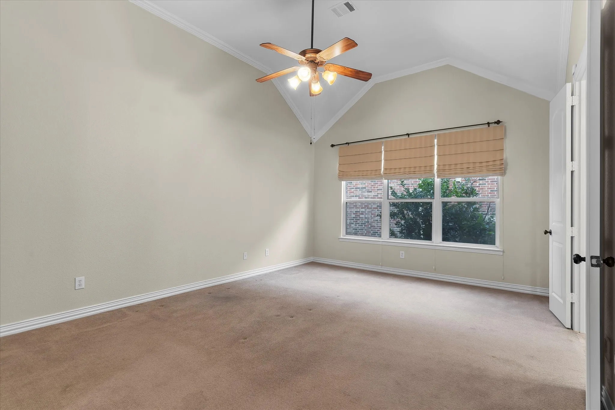 Primary Suite has tall ceilings and good light