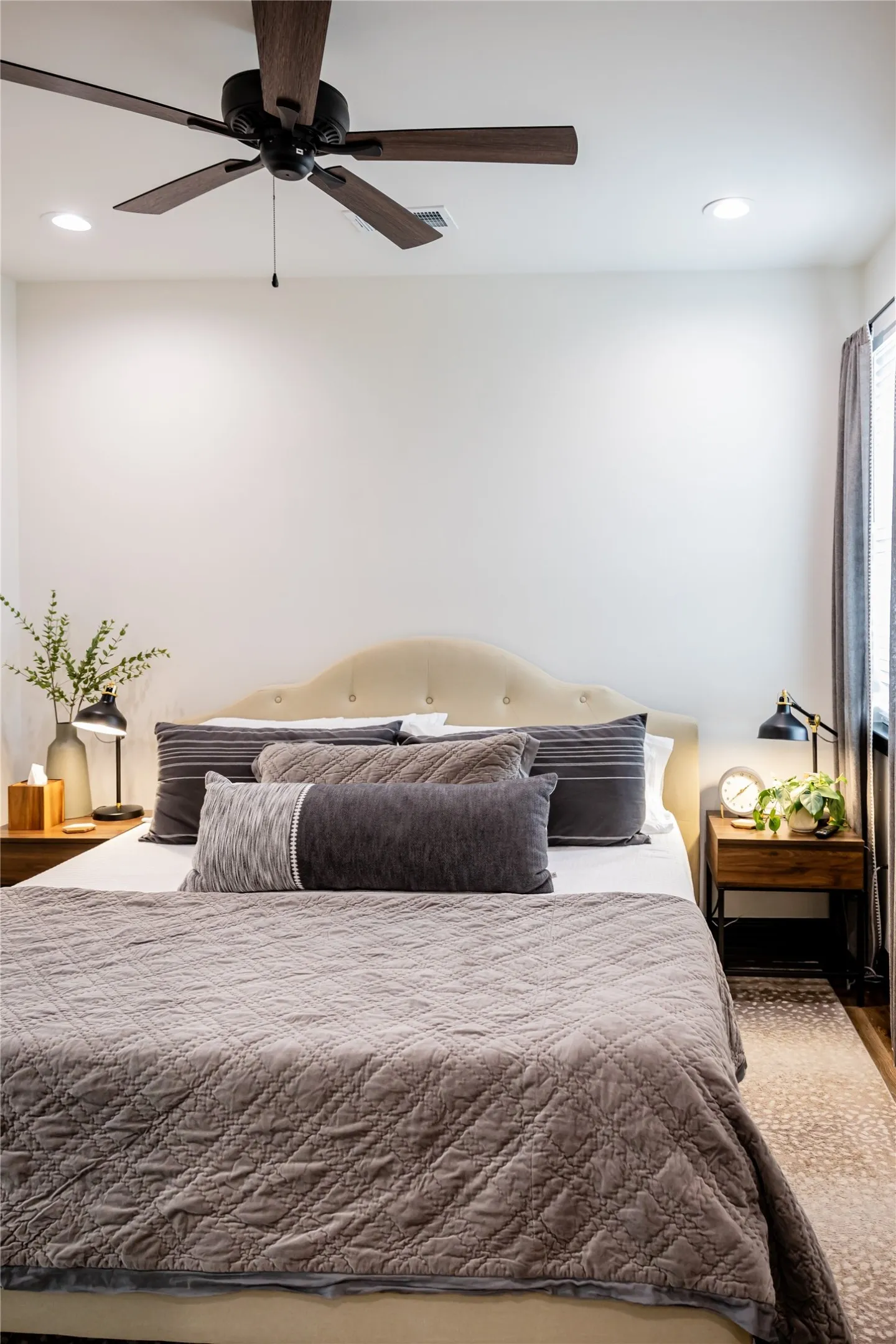 Bedroom featuring recessed lighting and a ceiling fan