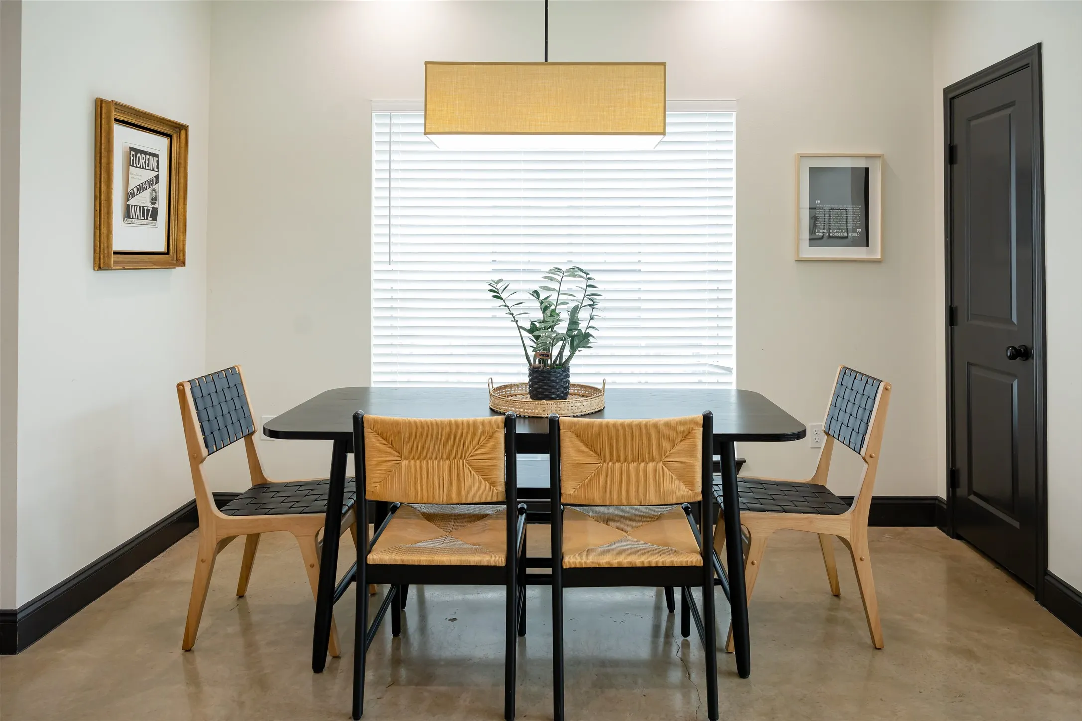 Dining area with finished concrete flooring and healthy amount of natural light