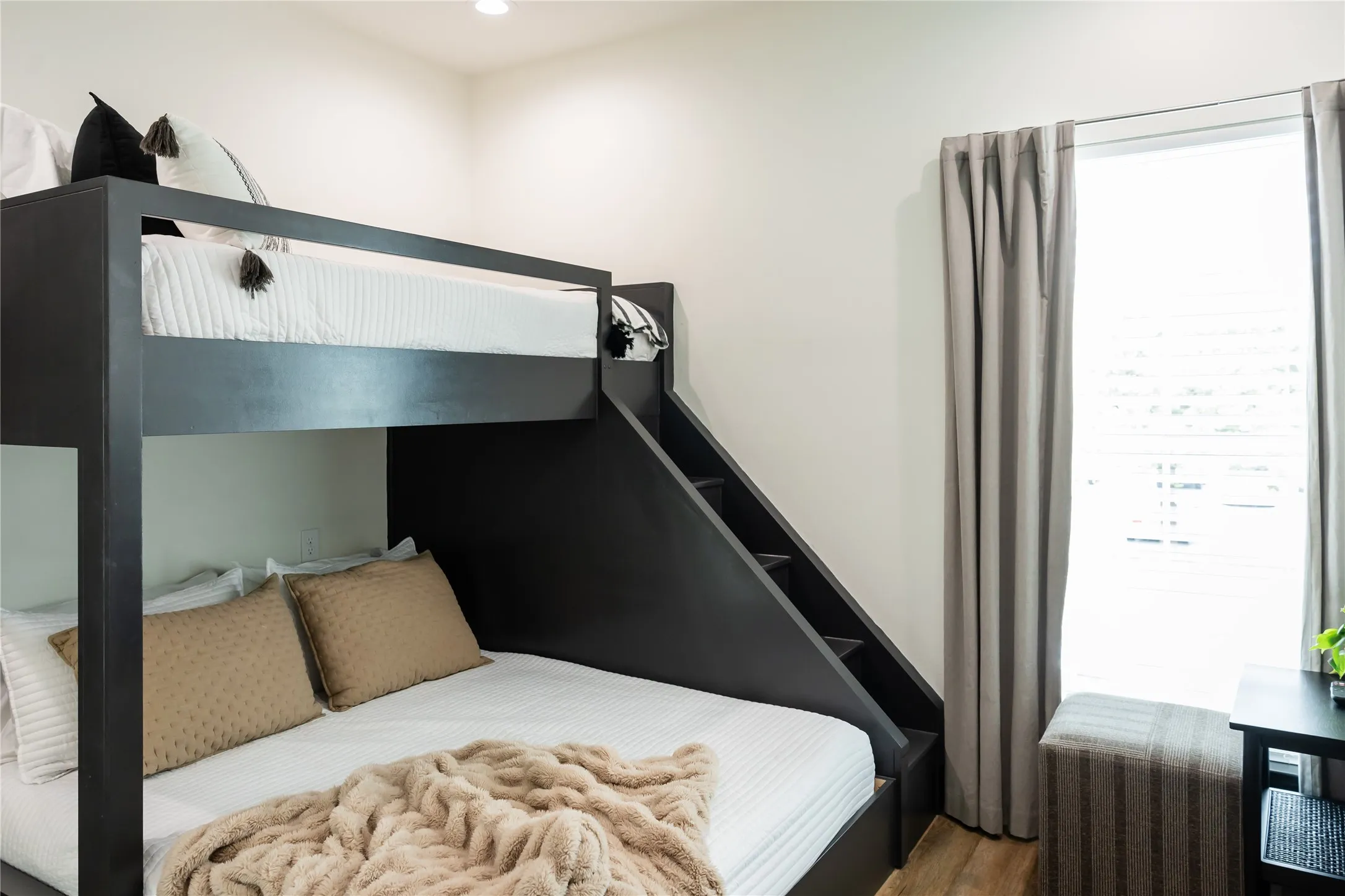 Bedroom featuring wood finished floors and recessed lighting