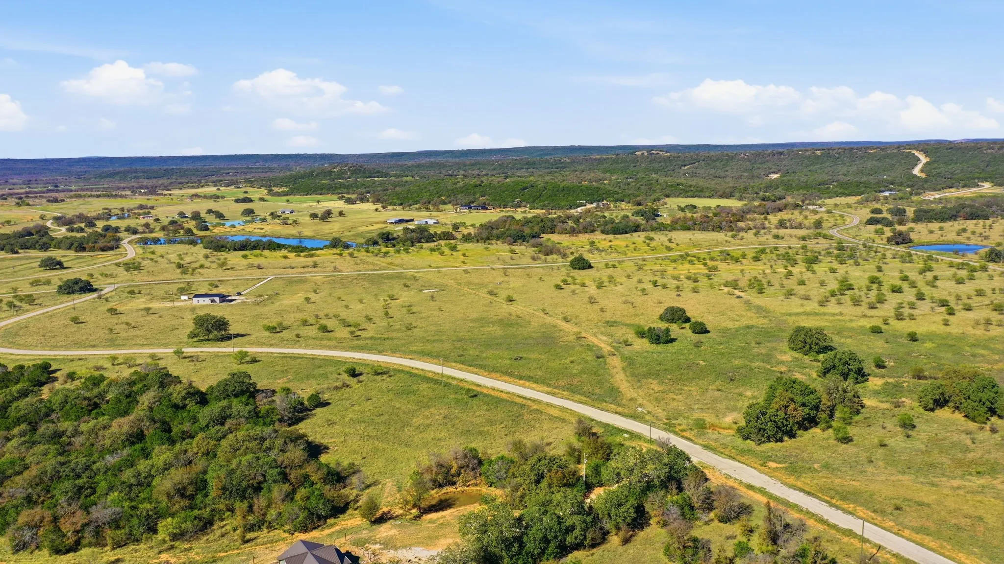 View of rural area featuring a nearby body of water
