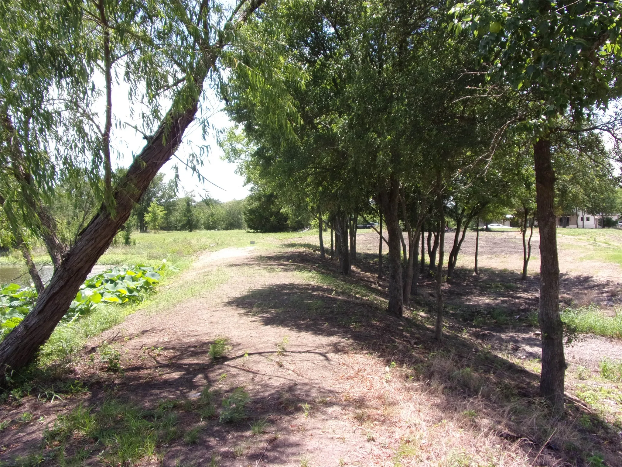 from back left hand corner walking over damn back towards street
