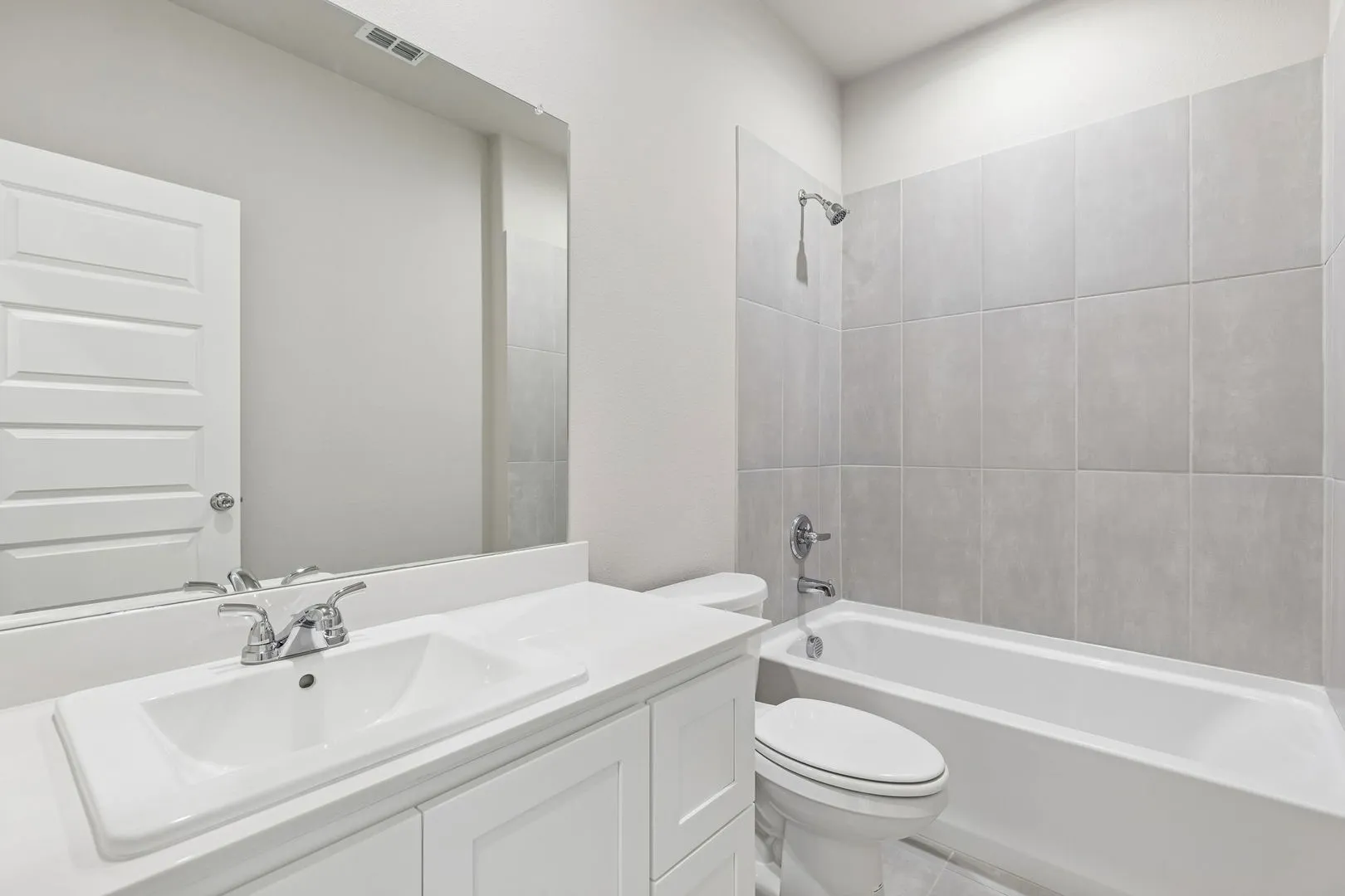 Bathroom in the Holden home plan by Trophy Signature Homes – REPRESENTATIVE PHOTO