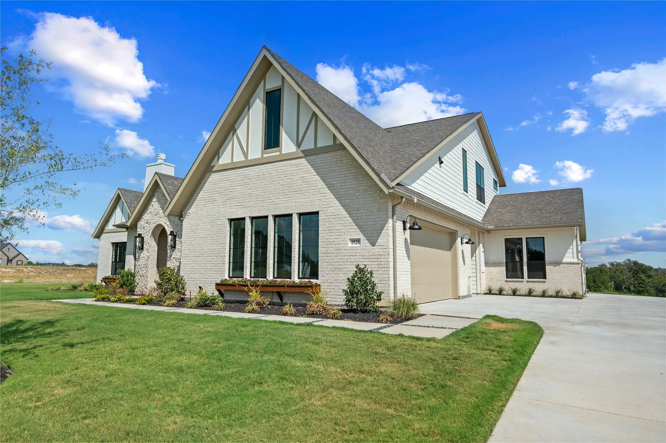 3rd car rear entry garage can double as workout room or pool house