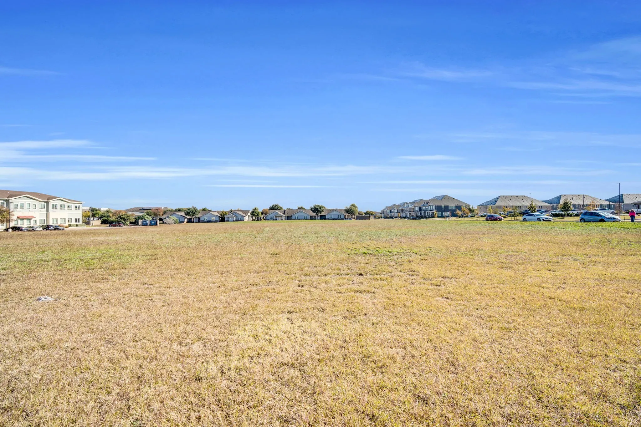 Another ground-level perspective of the open, level lot, ready for development.
