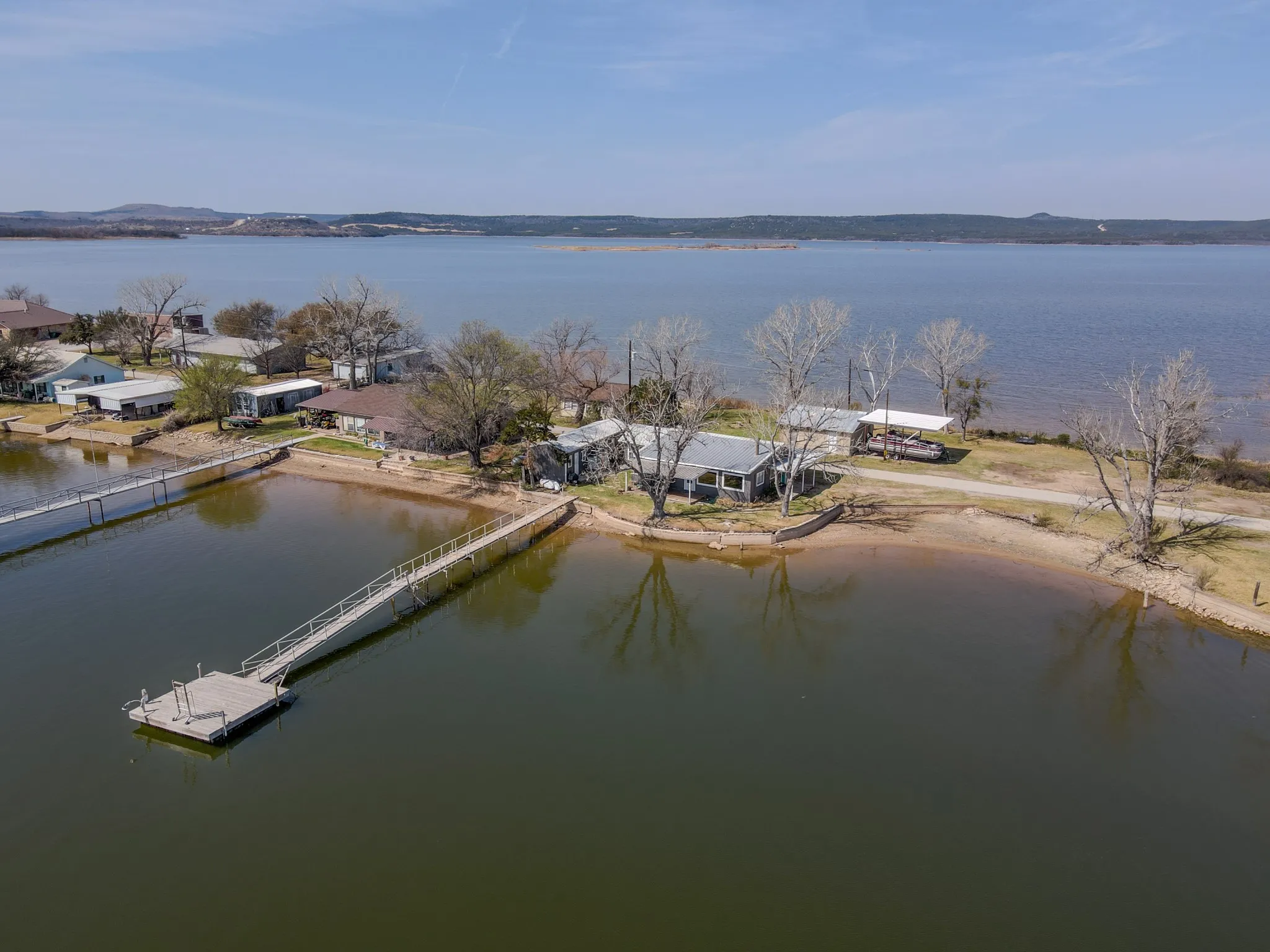 Single Family Residence For Sale in Palo Pinto County , 1203 Mc Ginnis Point, Graford, Texas 76449, 4 Bedroom, 2 Bathroom, 1 Garage spaces, 1,504 Sqft, built in 1980, Preowned, mls#21188448, Real Estate Agent in Graford, Homes For Sale in Palo Pinto county, Homes For Sale in Graford, Realtor in Graford Texas, Real Estate Brokerage Independent Realty Texas, Luminita Cordes Realtor