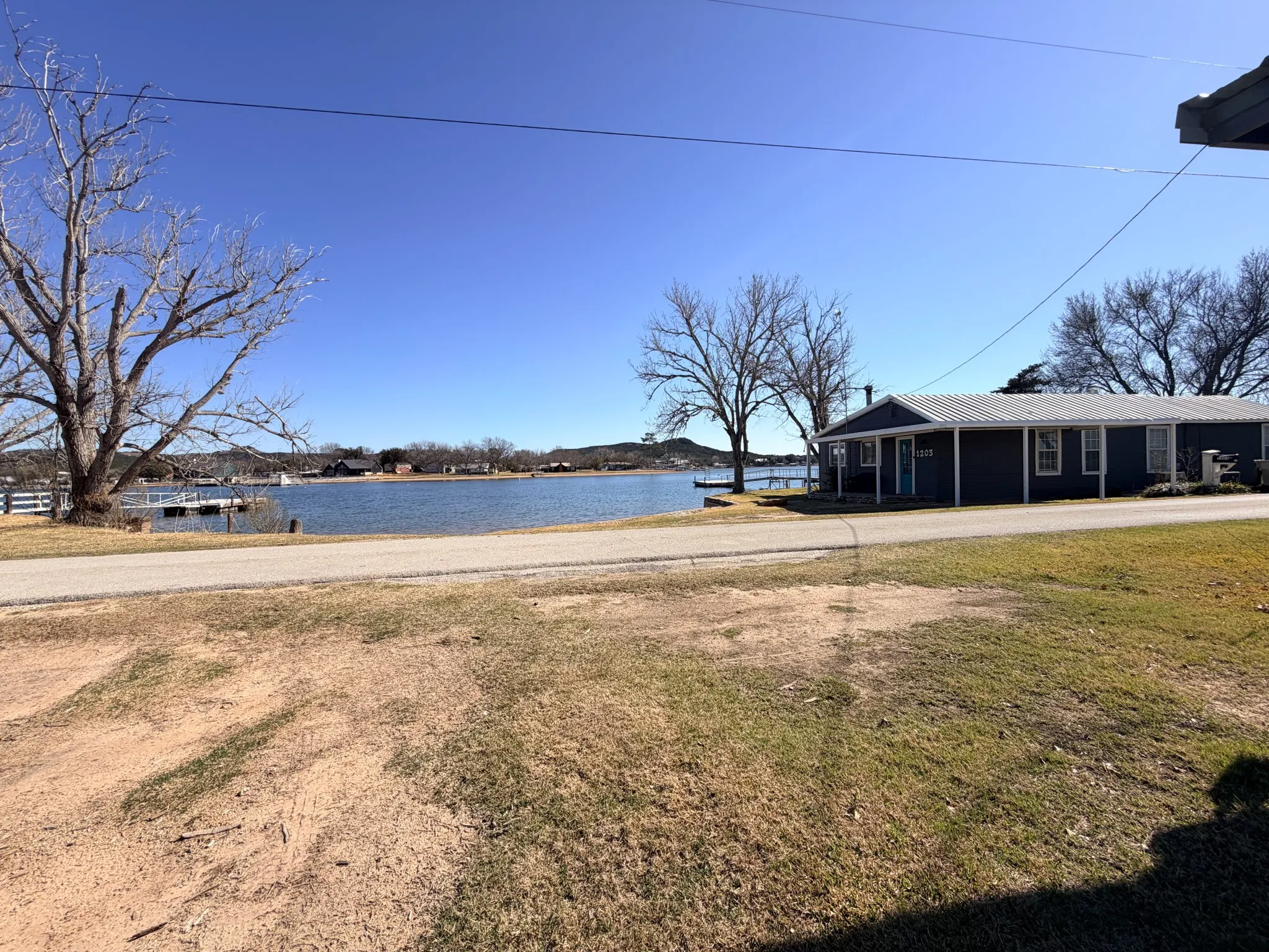 Single Family Residence For Sale in Palo Pinto County , 1203 Mc Ginnis Point, Graford, Texas 76449, 4 Bedroom, 2 Bathroom, 1 Garage spaces, 1,504 Sqft, built in 1980, Preowned, mls#21188448, Real Estate Agent in Graford, Homes For Sale in Palo Pinto county, Homes For Sale in Graford, Realtor in Graford Texas, Real Estate Brokerage Independent Realty Texas, Luminita Cordes Realtor