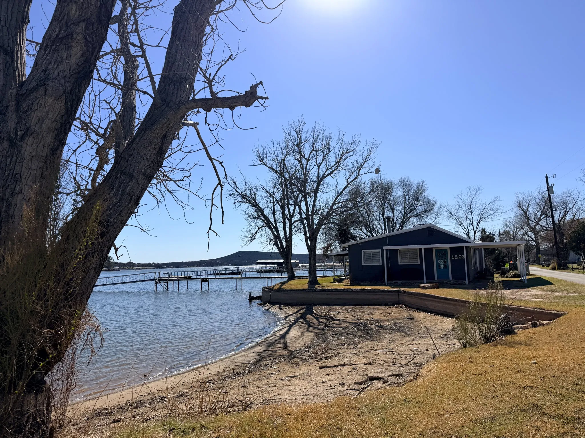 Single Family Residence For Sale in Palo Pinto County , 1203 Mc Ginnis Point, Graford, Texas 76449, 4 Bedroom, 2 Bathroom, 1 Garage spaces, 1,504 Sqft, built in 1980, Preowned, mls#21188448, Real Estate Agent in Graford, Homes For Sale in Palo Pinto county, Homes For Sale in Graford, Realtor in Graford Texas, Real Estate Brokerage Independent Realty Texas, Luminita Cordes Realtor