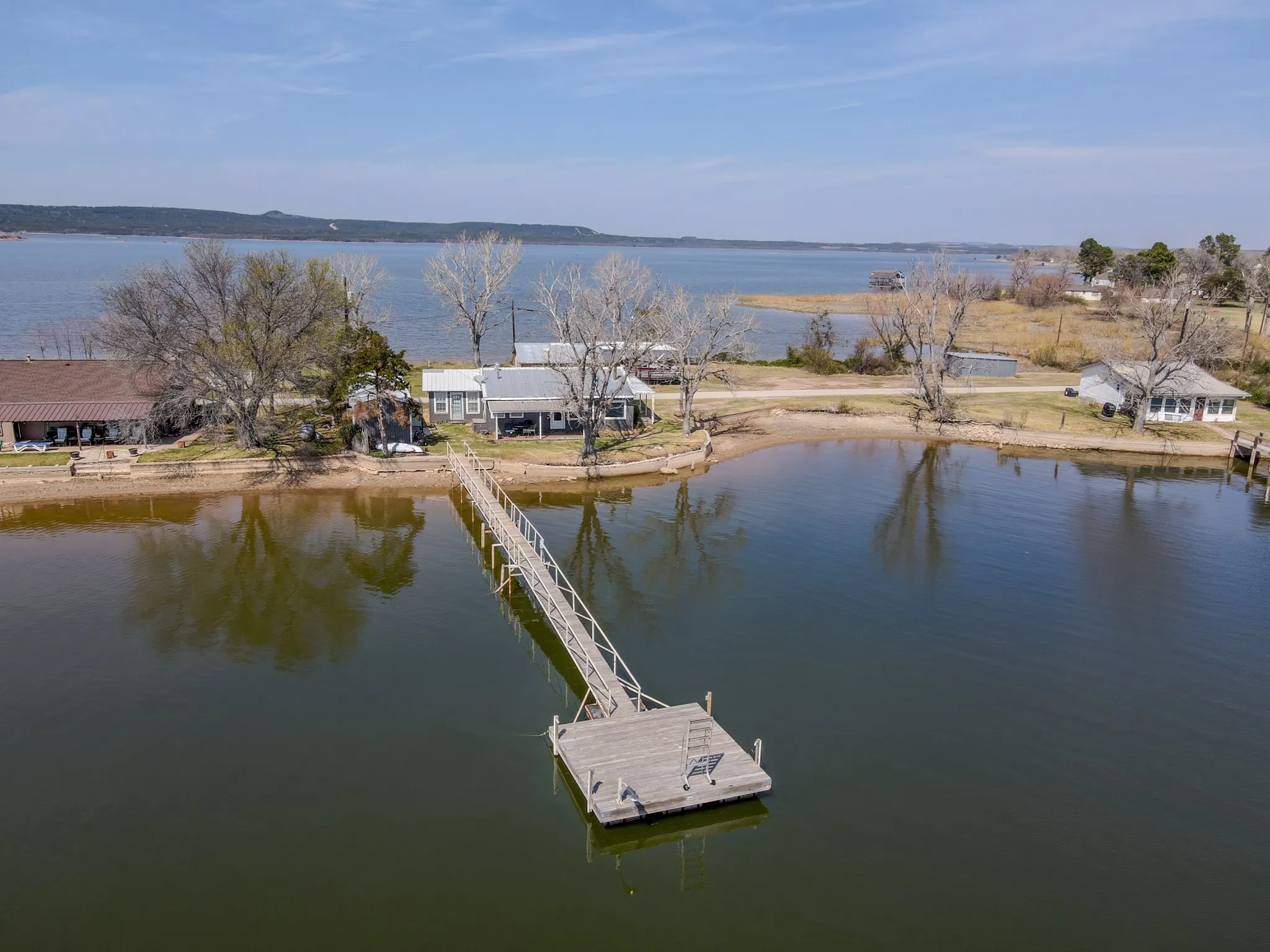 Single Family Residence For Sale in Palo Pinto County , 1203 Mc Ginnis Point, Graford, Texas 76449, 4 Bedroom, 2 Bathroom, 1 Garage spaces, 1,504 Sqft, built in 1980, Preowned, mls#21188448, Real Estate Agent in Graford, Homes For Sale in Palo Pinto county, Homes For Sale in Graford, Realtor in Graford Texas, Real Estate Brokerage Independent Realty Texas, Luminita Cordes Realtor