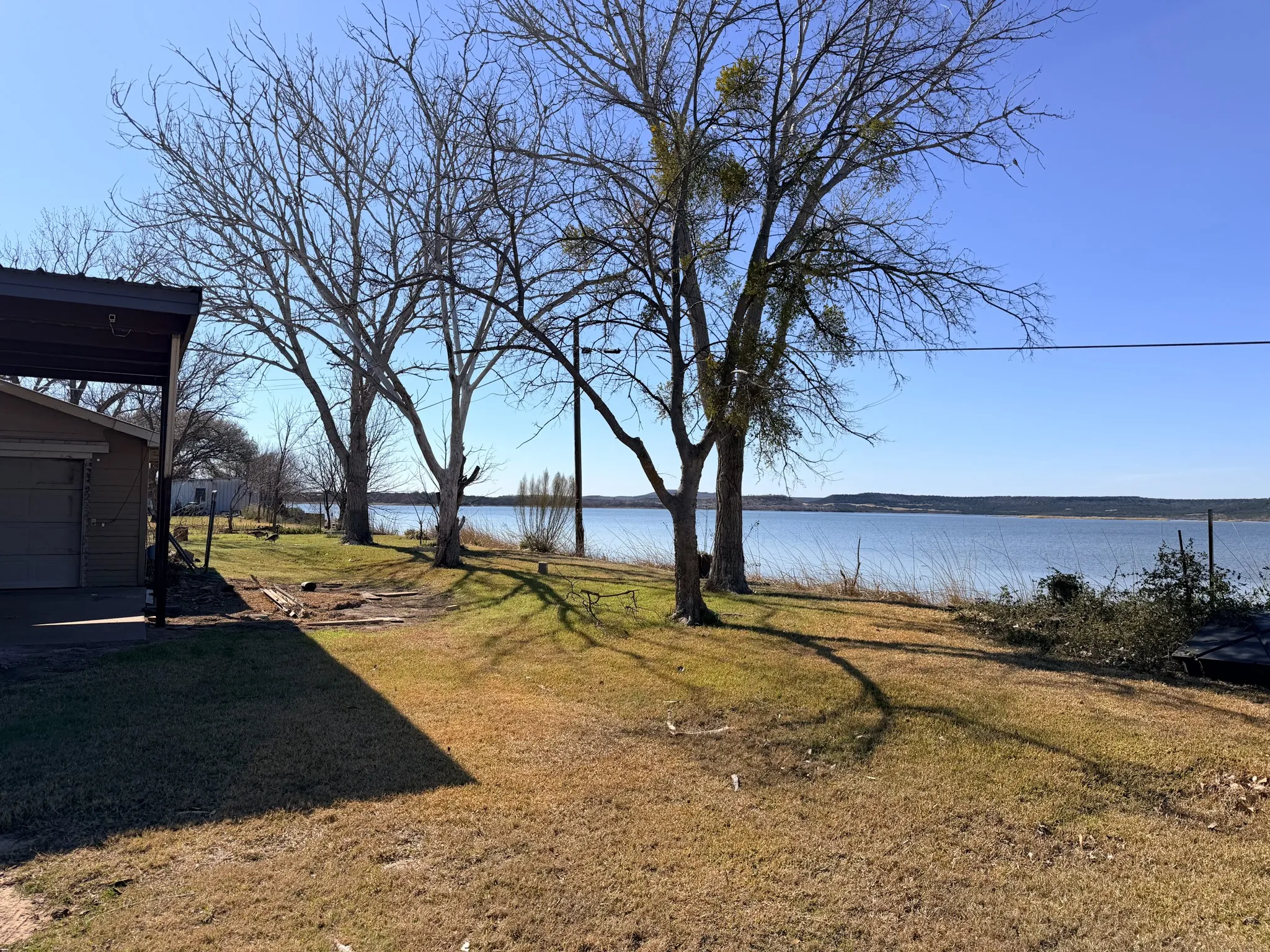 Single Family Residence For Sale in Palo Pinto County , 1203 Mc Ginnis Point, Graford, Texas 76449, 4 Bedroom, 2 Bathroom, 1 Garage spaces, 1,504 Sqft, built in 1980, Preowned, mls#21188448, Real Estate Agent in Graford, Homes For Sale in Palo Pinto county, Homes For Sale in Graford, Realtor in Graford Texas, Real Estate Brokerage Independent Realty Texas, Luminita Cordes Realtor