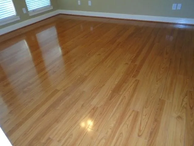 Detailed view of wood finished floors and baseboards