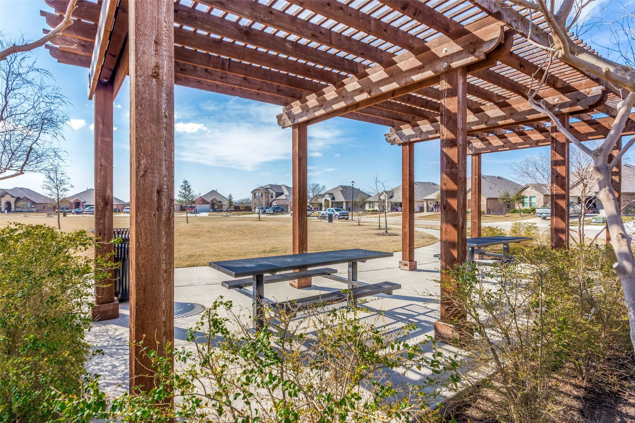View of patio / terrace featuring a residential view and a pergola
