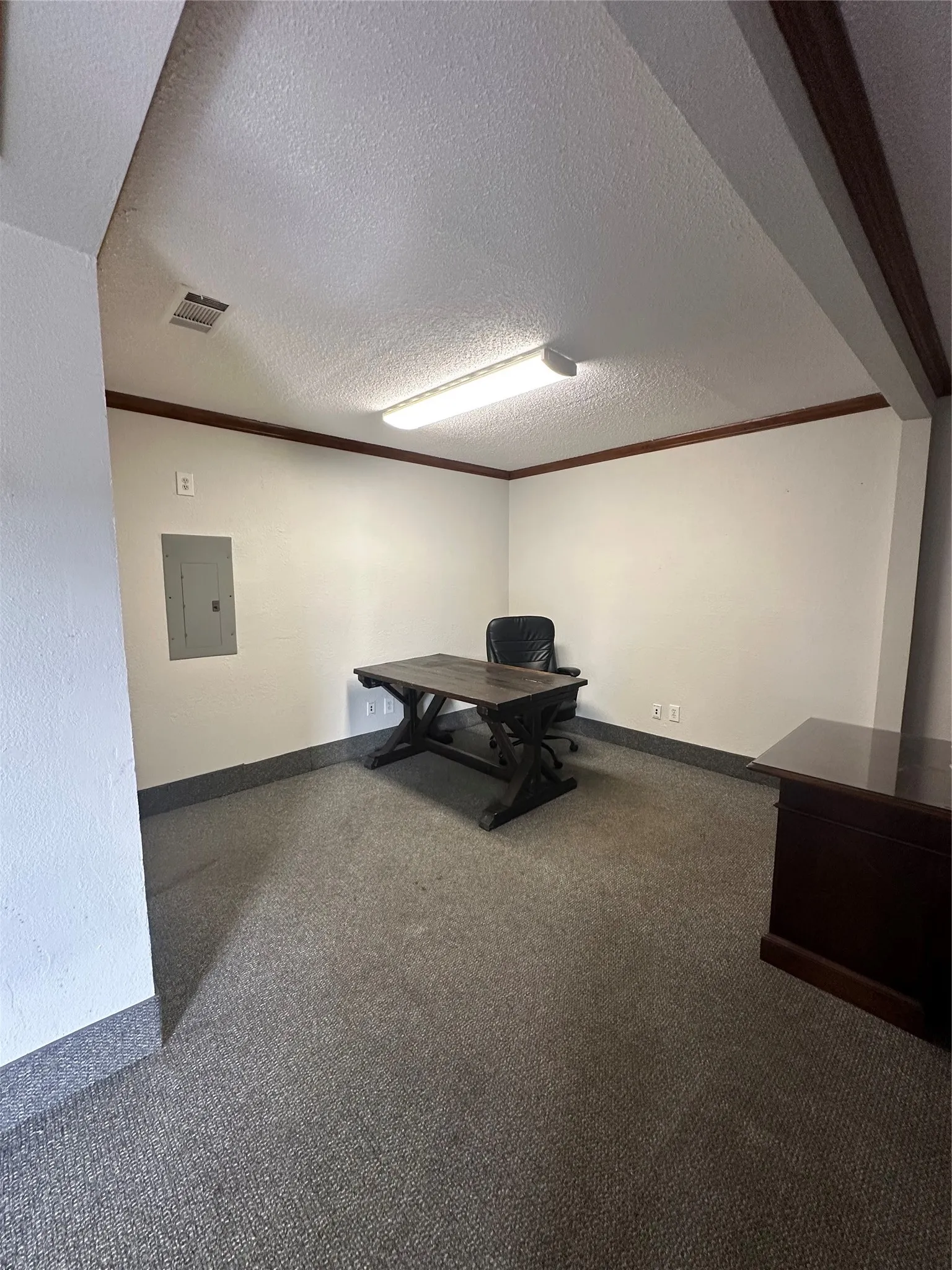 This is an area of the bullpen.  Ample space for multiple desk or work space.