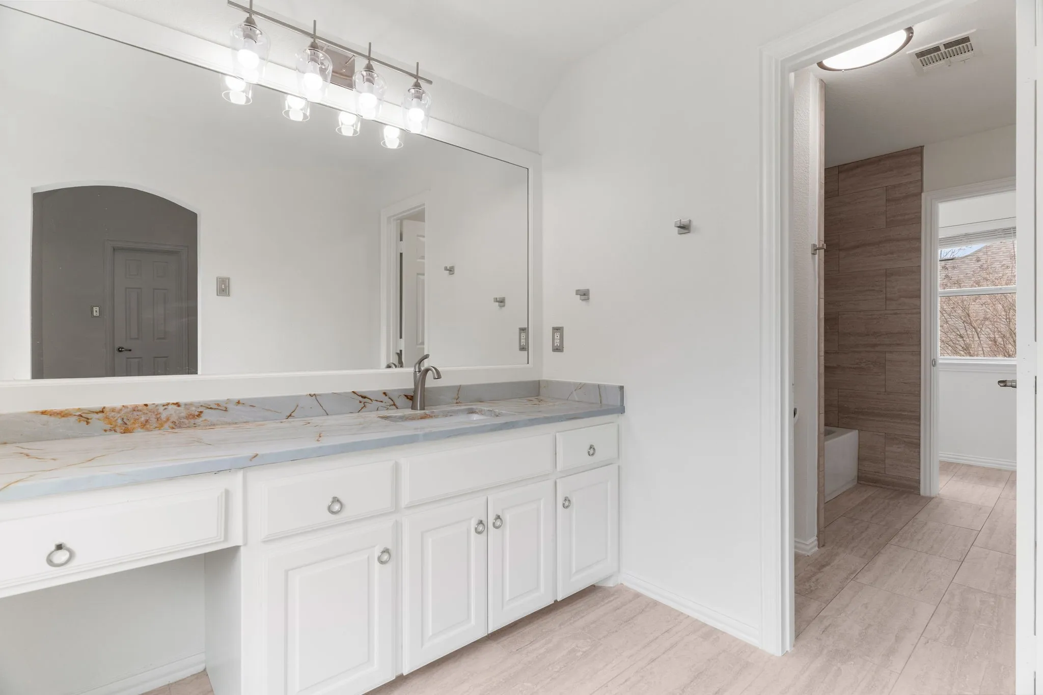 Left side shared bath.