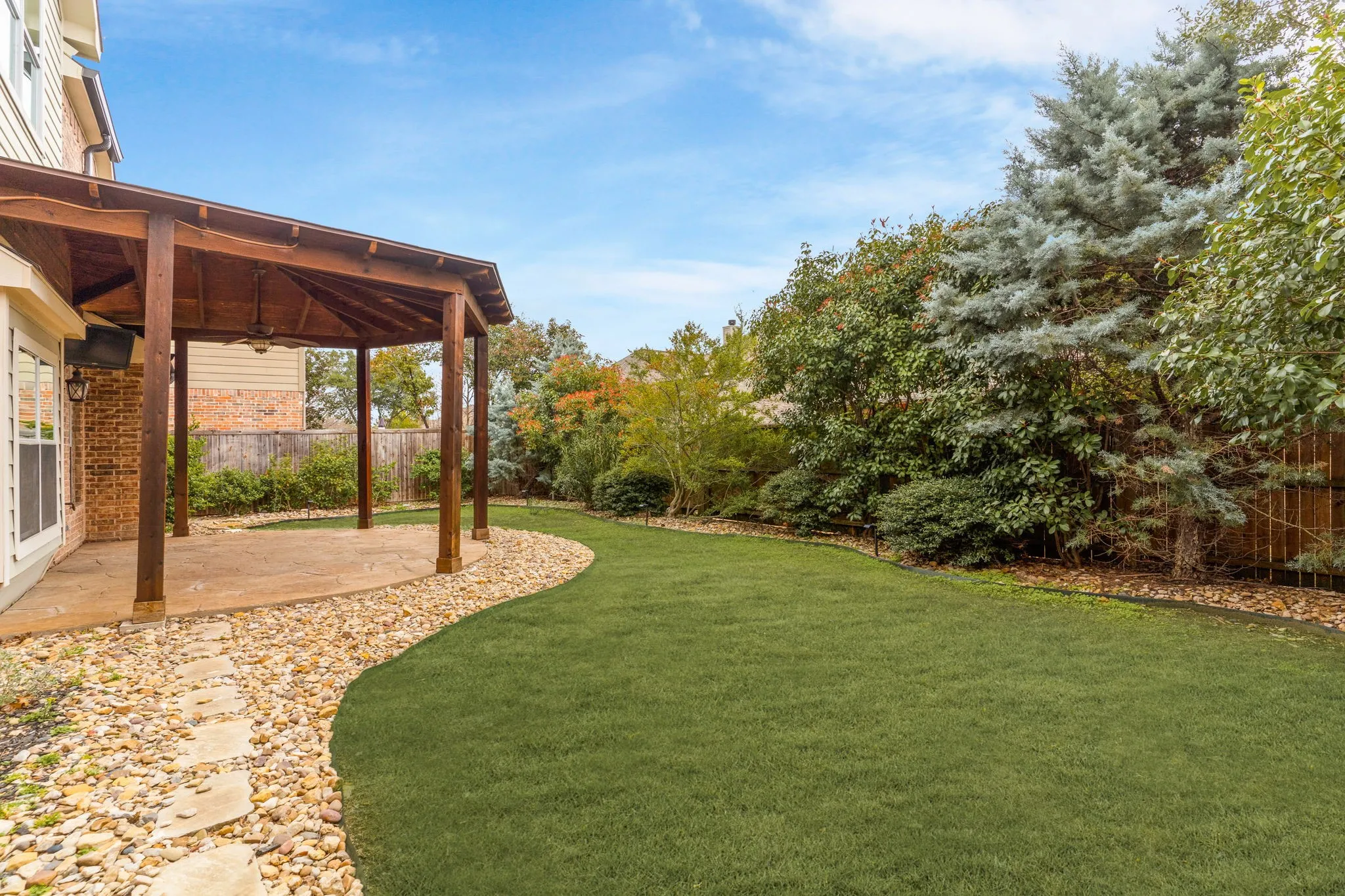 You'll love the privacy in your backyard from the mature, nature landscape behind + the opportunity to dine al fresco on the back patio.