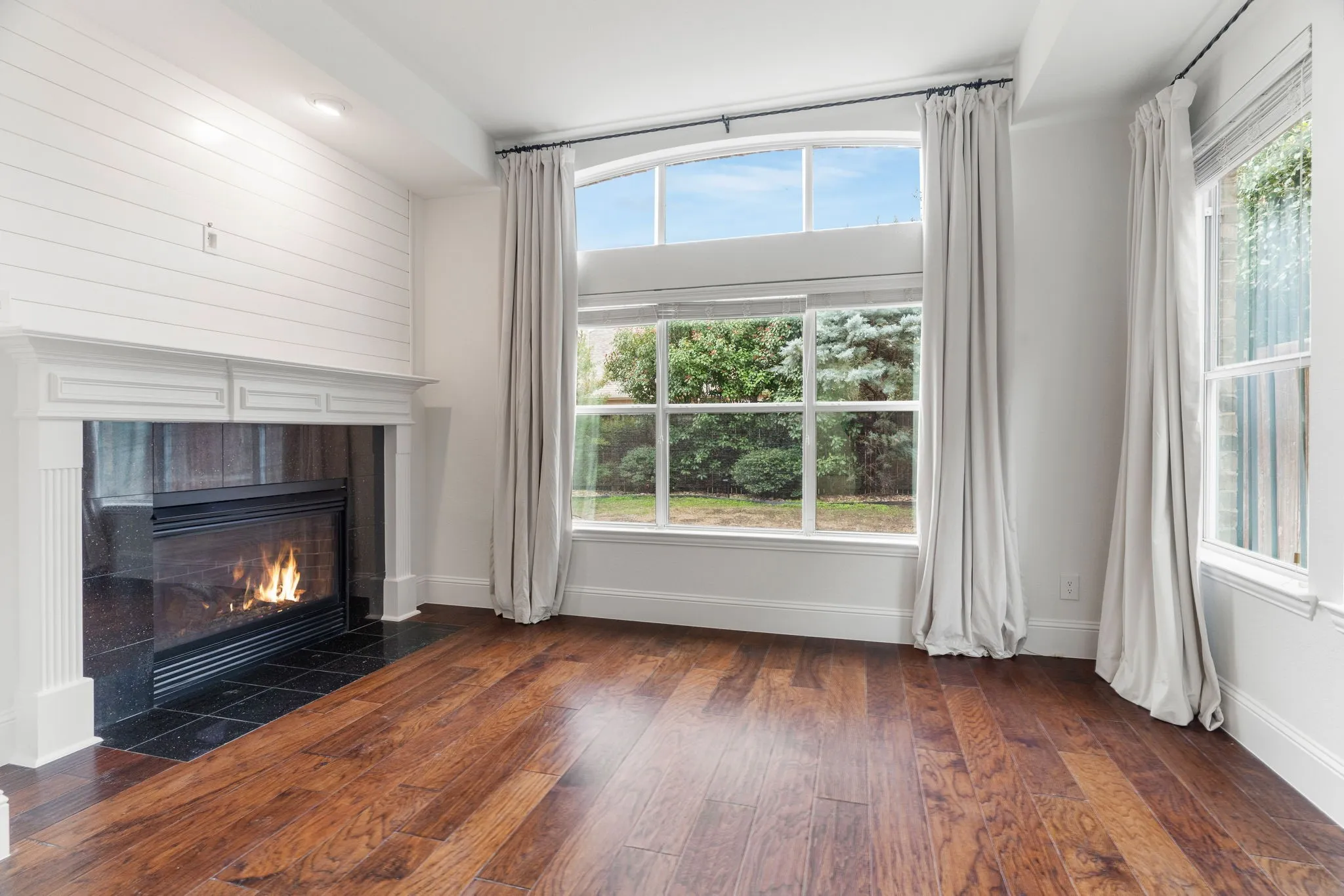 Cozy up to the fireplace to read a book or use as a second office.