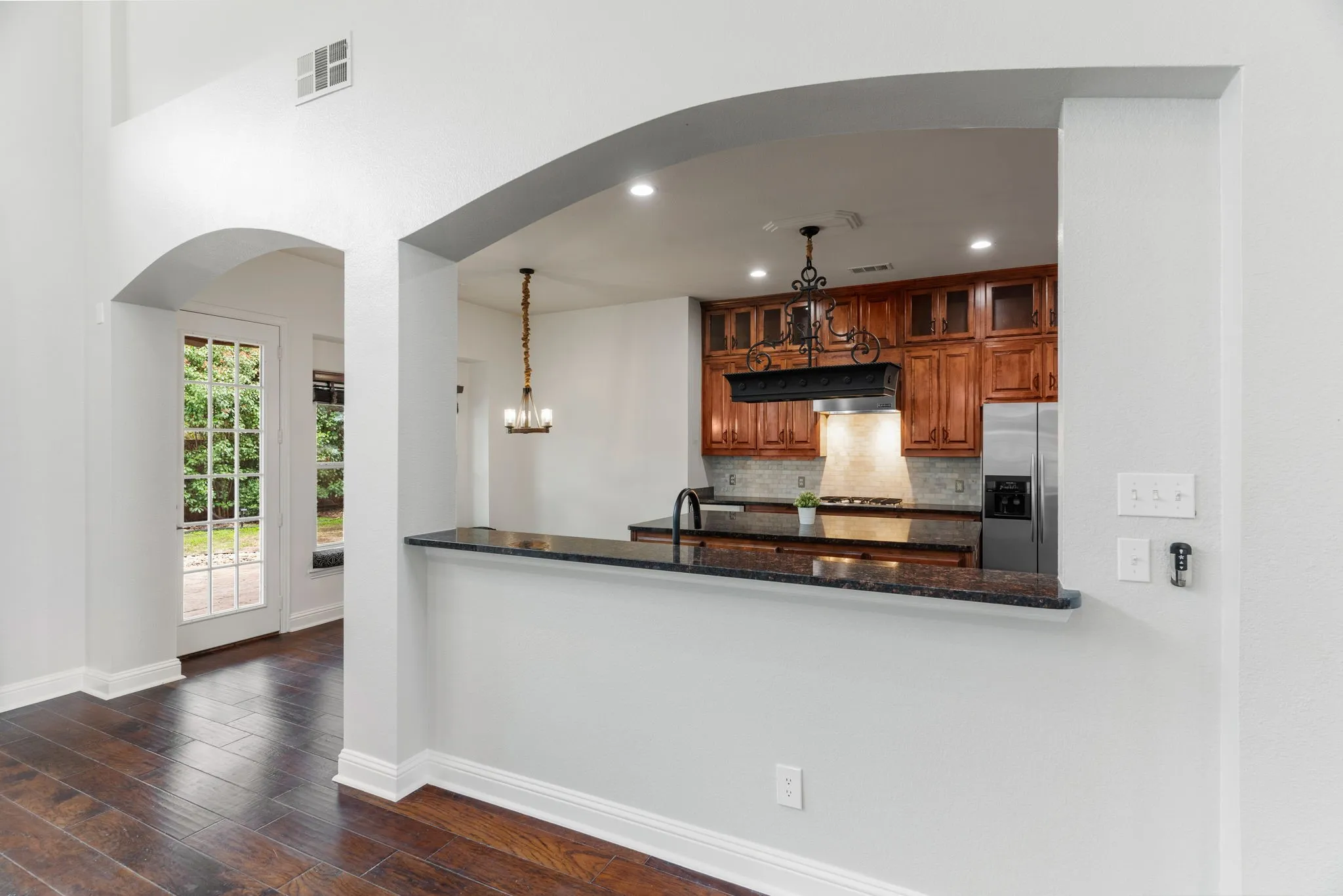 Breakfast bar option at the granite countertop for more casual dining. Whole house repainted!!