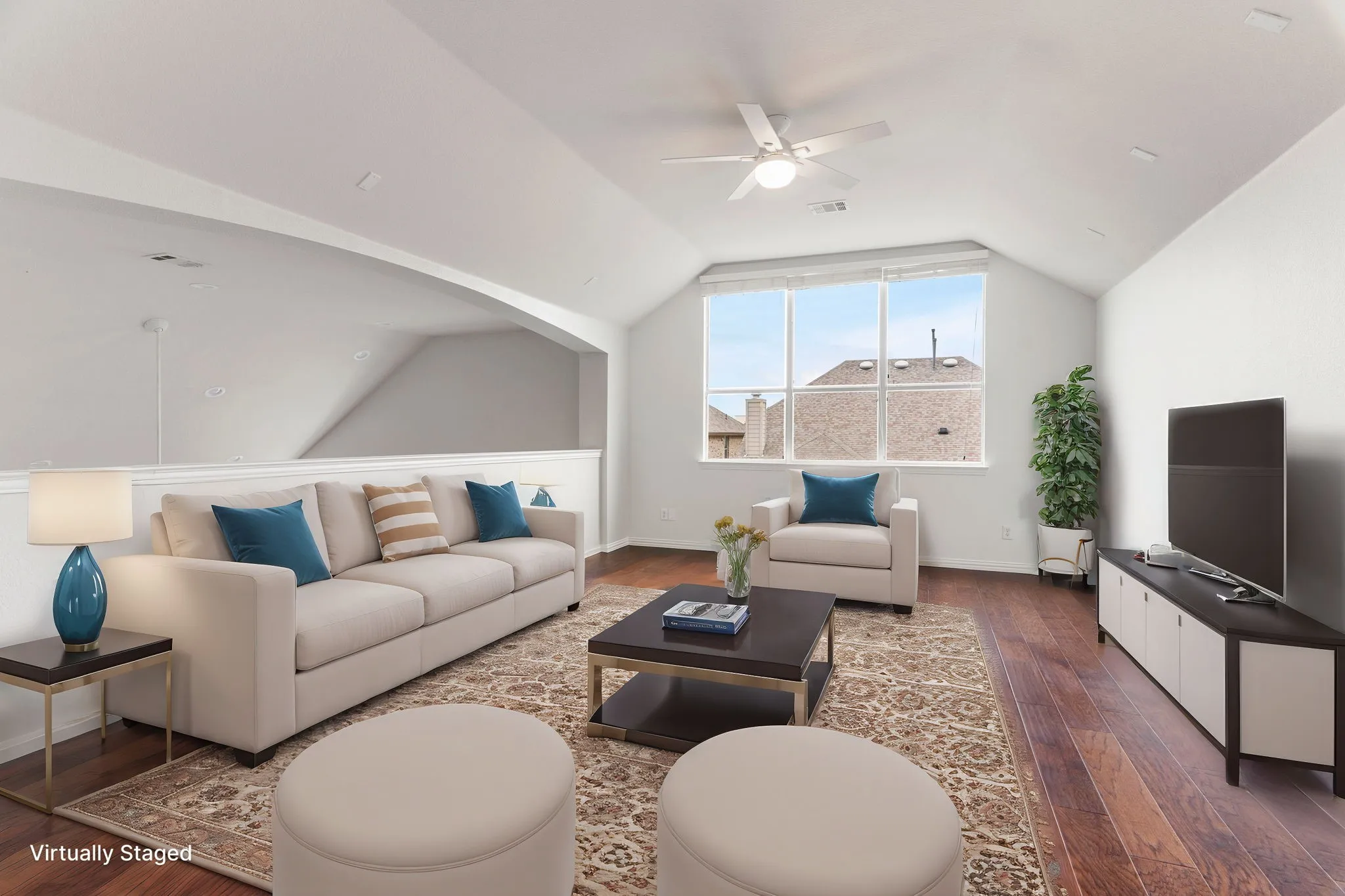 Huge gameroom overlooks the family room below.