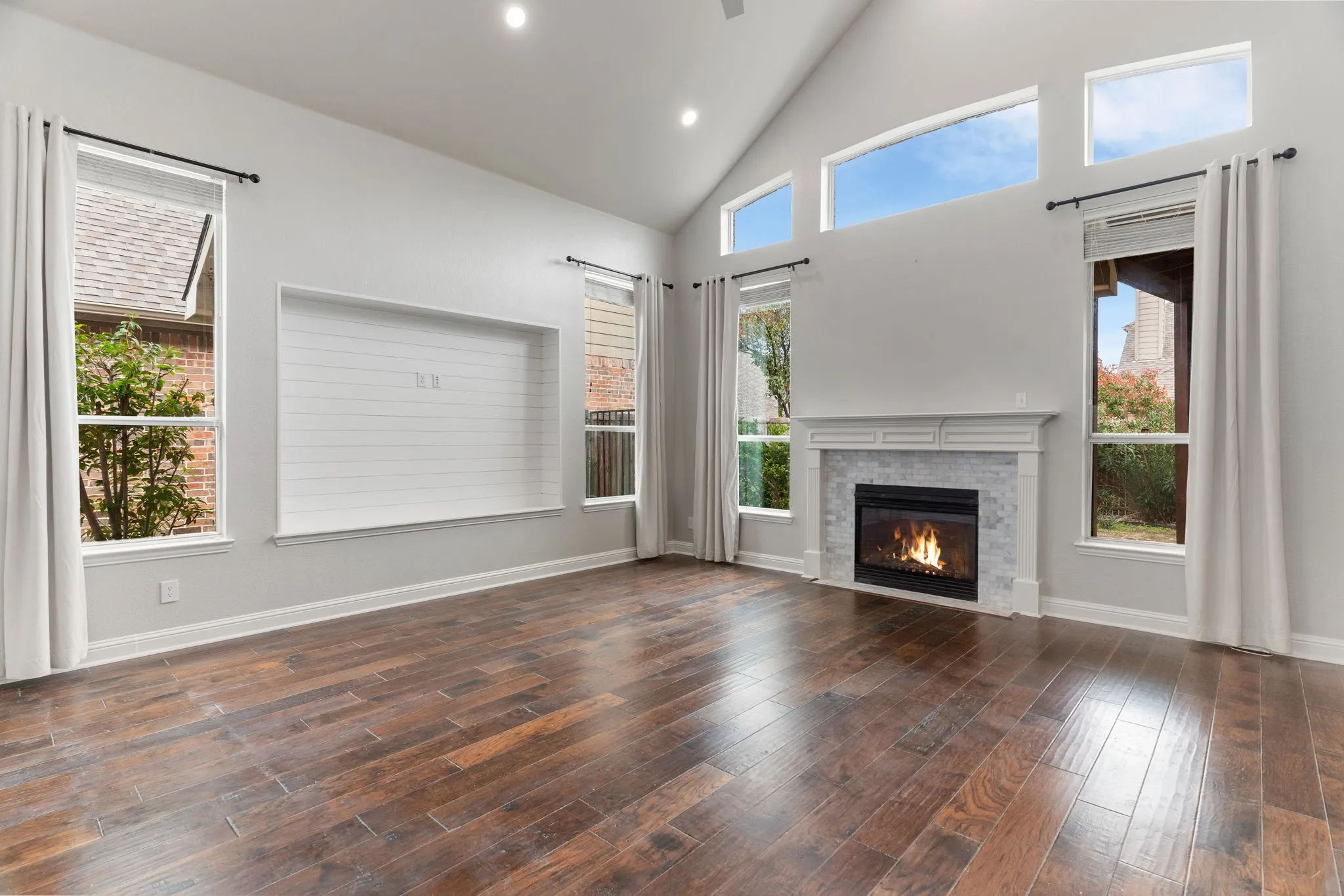 Note the shiplap inlay for your flat screen TV & the new fireplace surround.