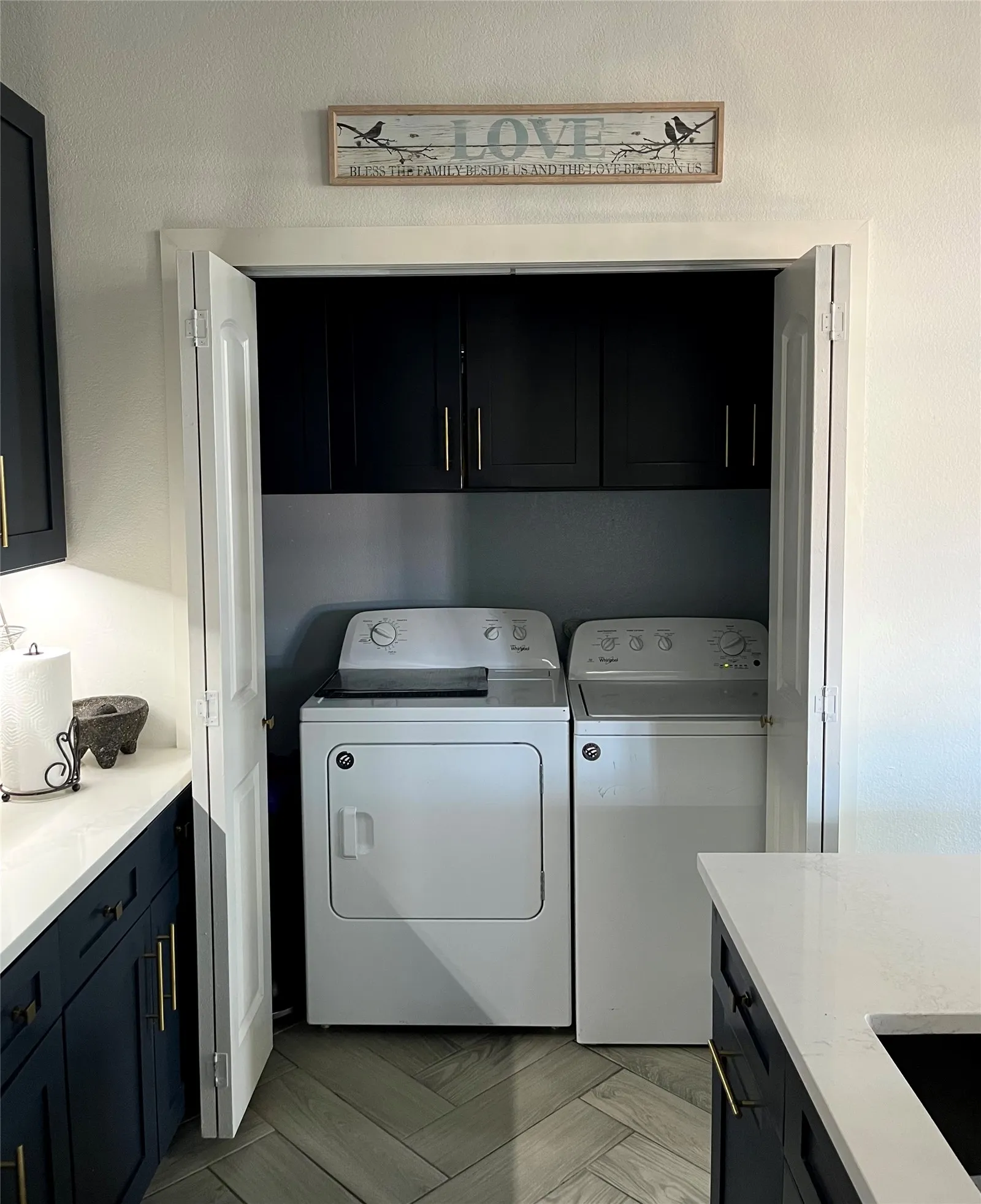 Laundry room with some additional storage.