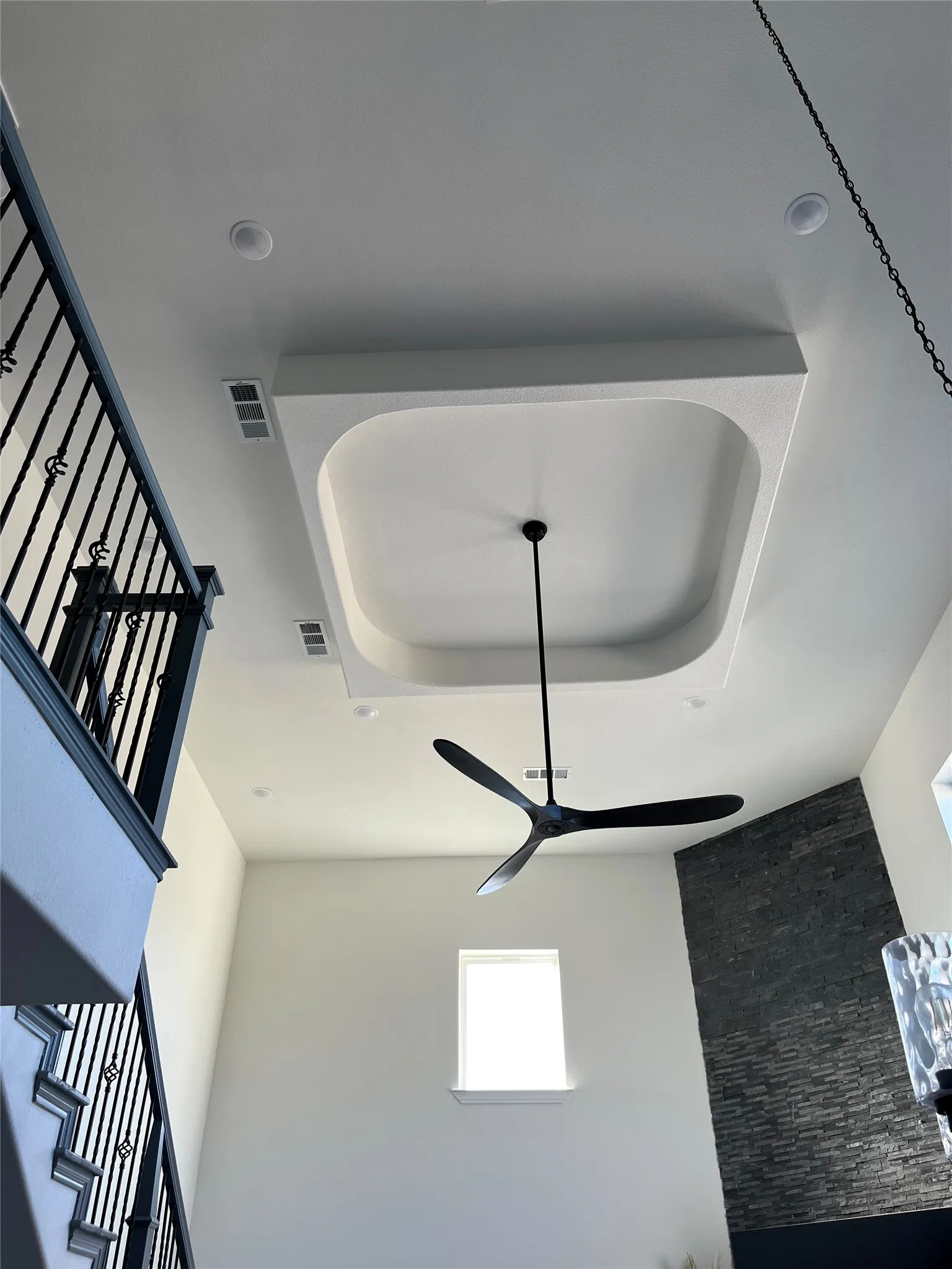 Arial view of ceiling from the stairs from second level.