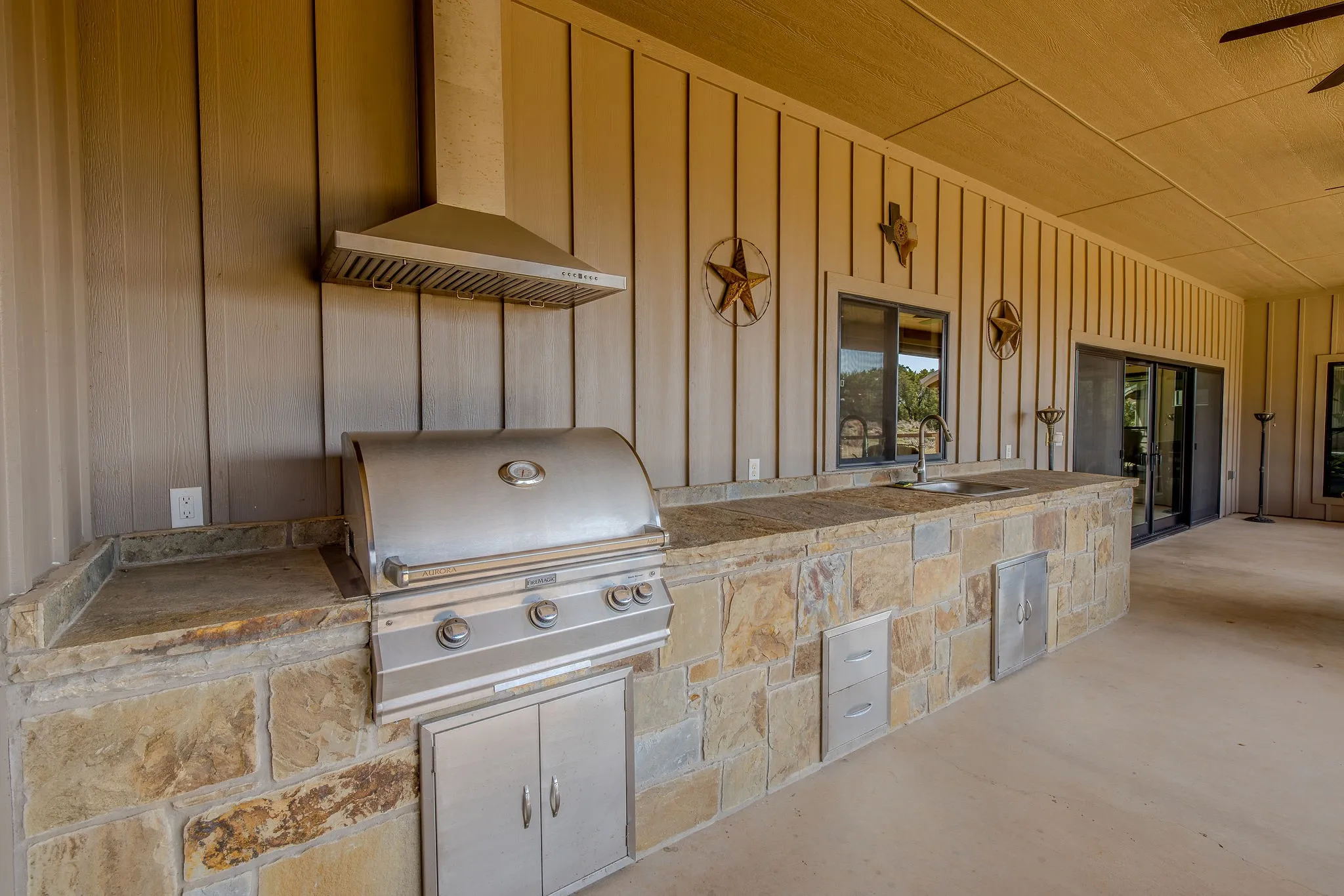 Well thout out outdoor kitchen with high end appliances for ultimate enjoyment.