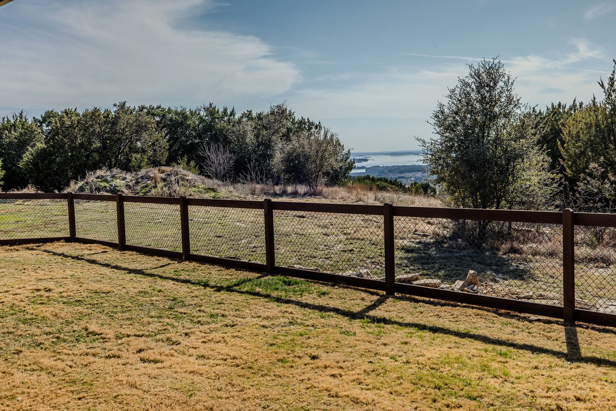 Large, fenced backyard with an amazing view of Possum Kingdom Lake!