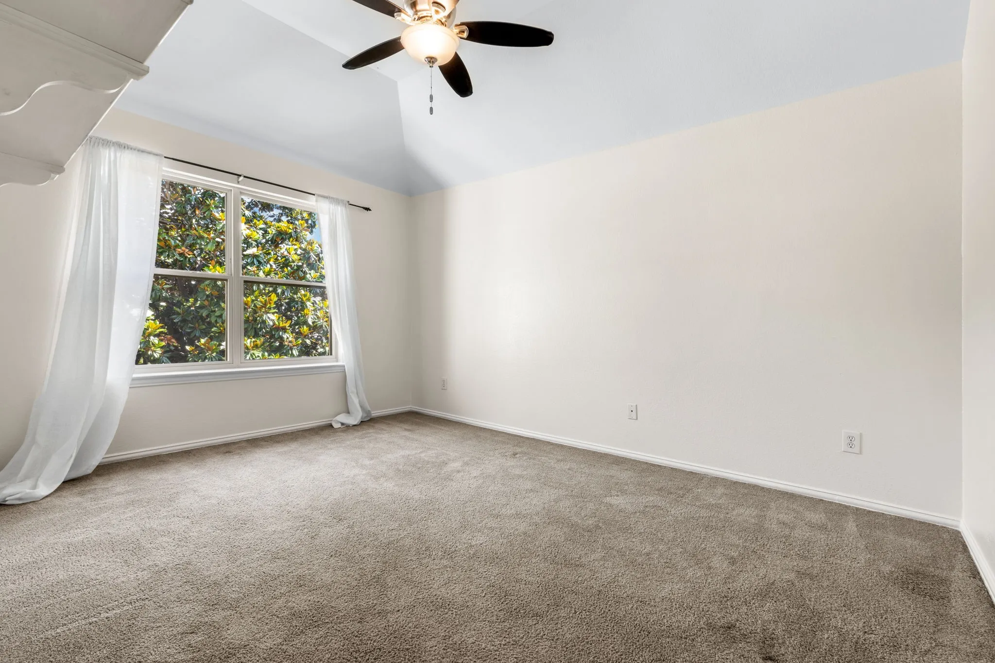 2nd Spacious bedroom upstairs vaulted ceilings, a ceiling fan, walk in closet