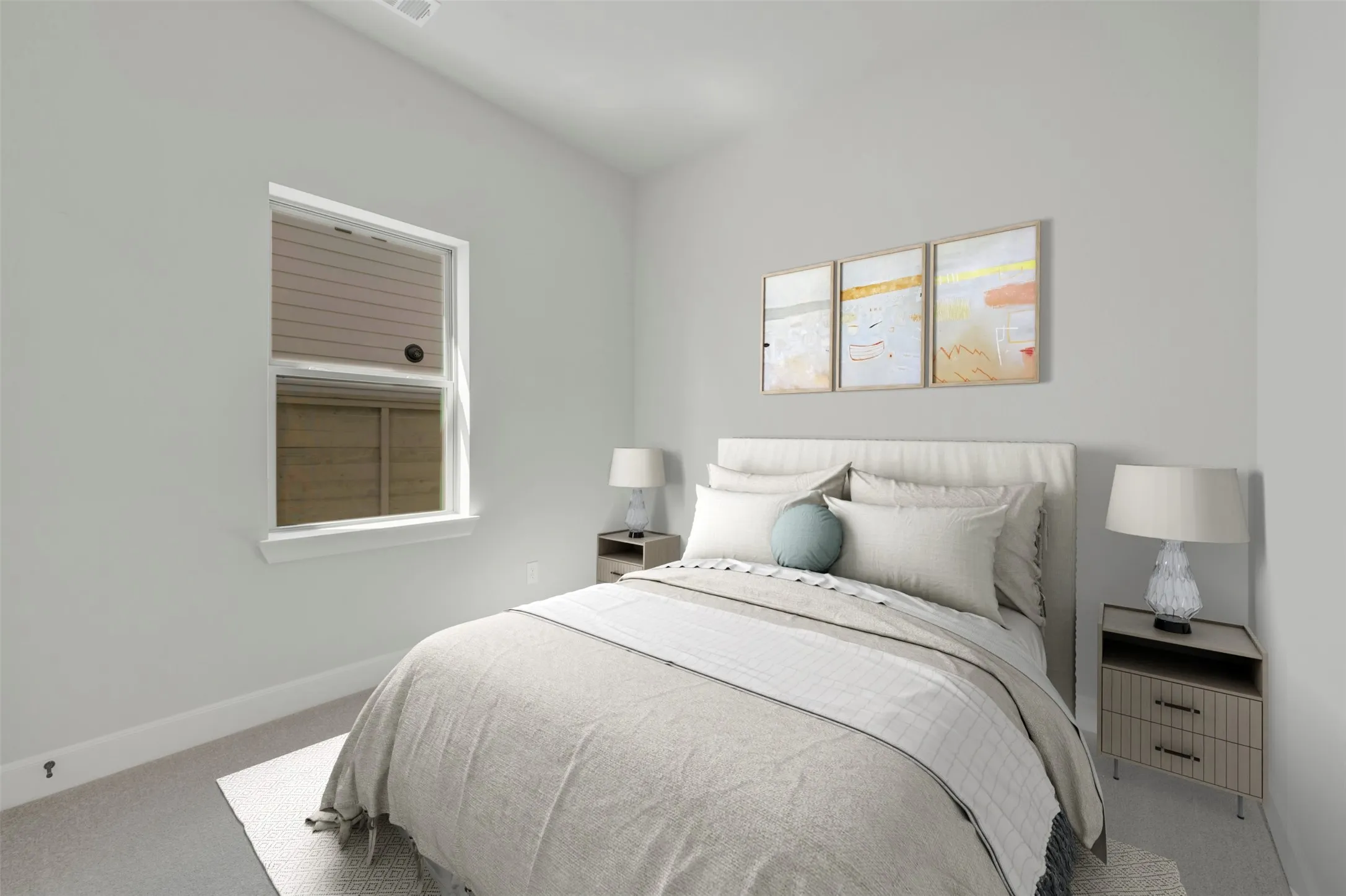 Spacious room featuring neutral carpeting and light-colored walls