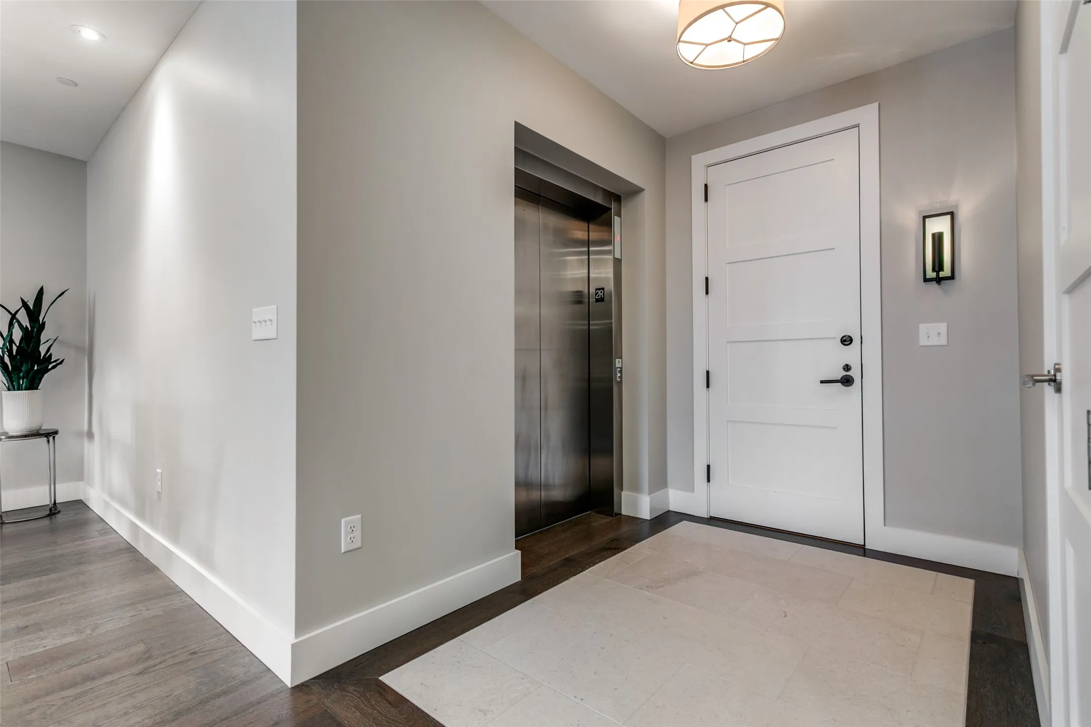 Entry featuring direct access elevator.