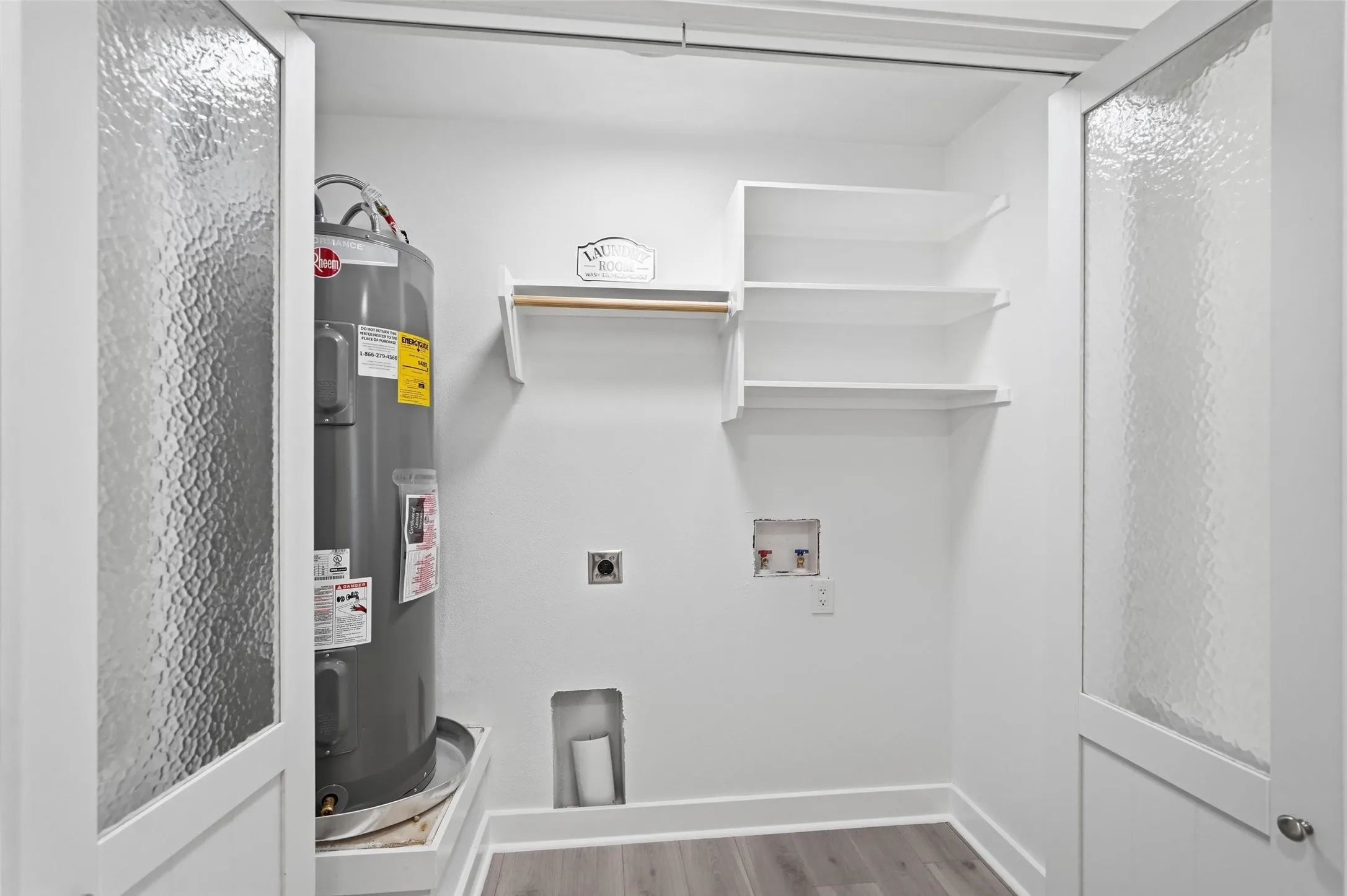 Large laundry room designed for convenience and everyday functionality.